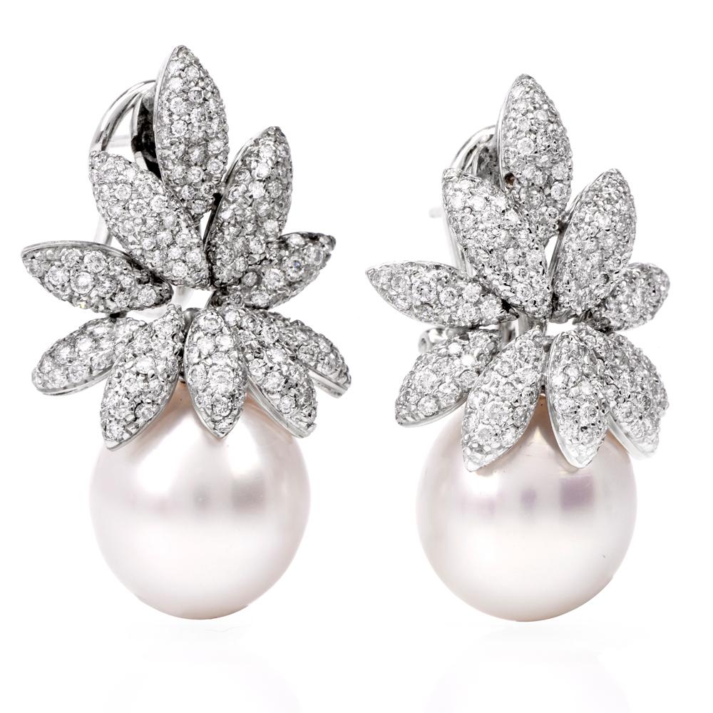 These lovely Diamond & Pearl earrings display a floral cluster motif, and are crafted in solid 18K white gold. They are adorned with 326 genuine round cut Diamonds of approx: 2.75 carats, G-H  color, VS clarity, prong set, suspended by 2 genuine