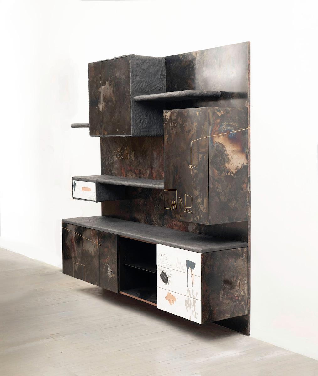 Stefan Rurak’s encompassing wall unit typifies his unique approach to design. Designed as a fully integrated work, the wall is a flexible design, suitable as a bar, a dining room server, for the bedroom or office, or as an engaging focal point for