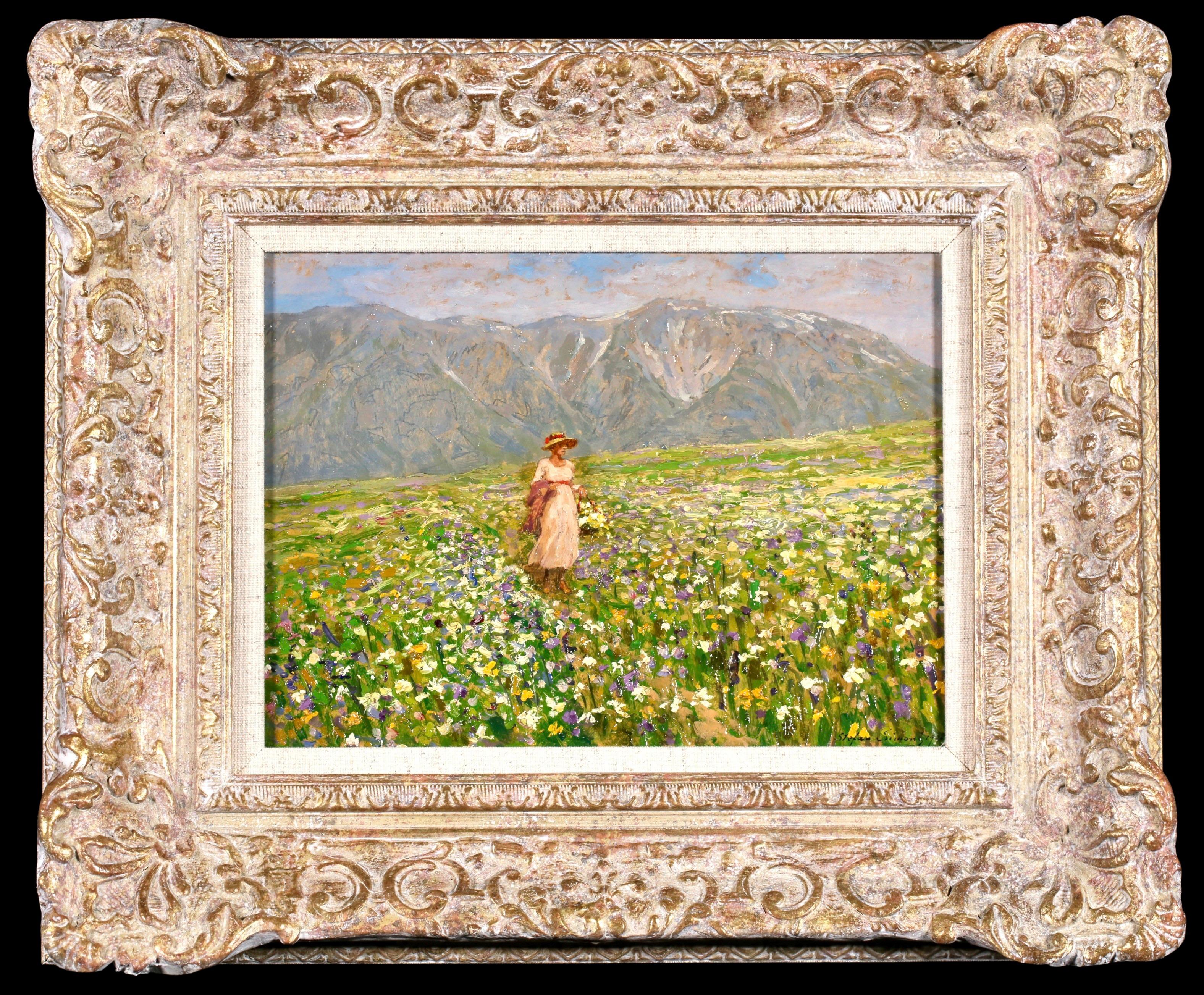 Signiert und datiert Öl auf Karton Figur in Landschaft von österreichischen postimpressionistischen Maler Stefan Simony. Das Werk zeigt eine Frau in einem Feld voller Wildblumen mit Blick auf die Berge im Hintergrund. Die Szene ist eine Ansicht von