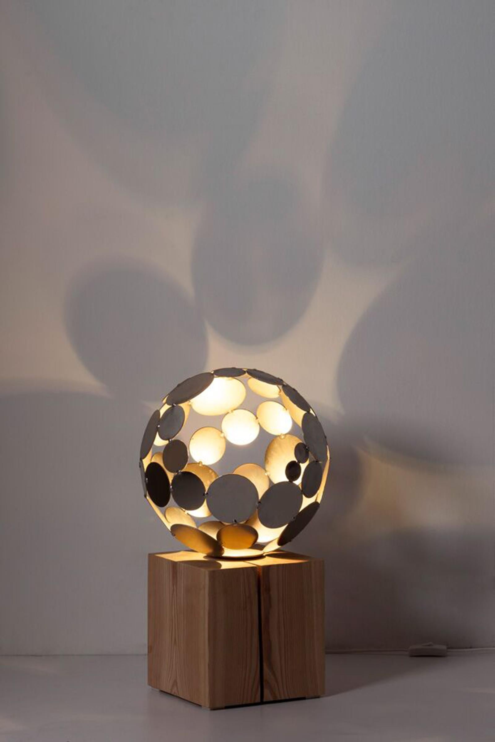 Contemporary Sculpture - "Globe Lamp", rusted on an oak pedestal - small height - Art by Stefan Traloc