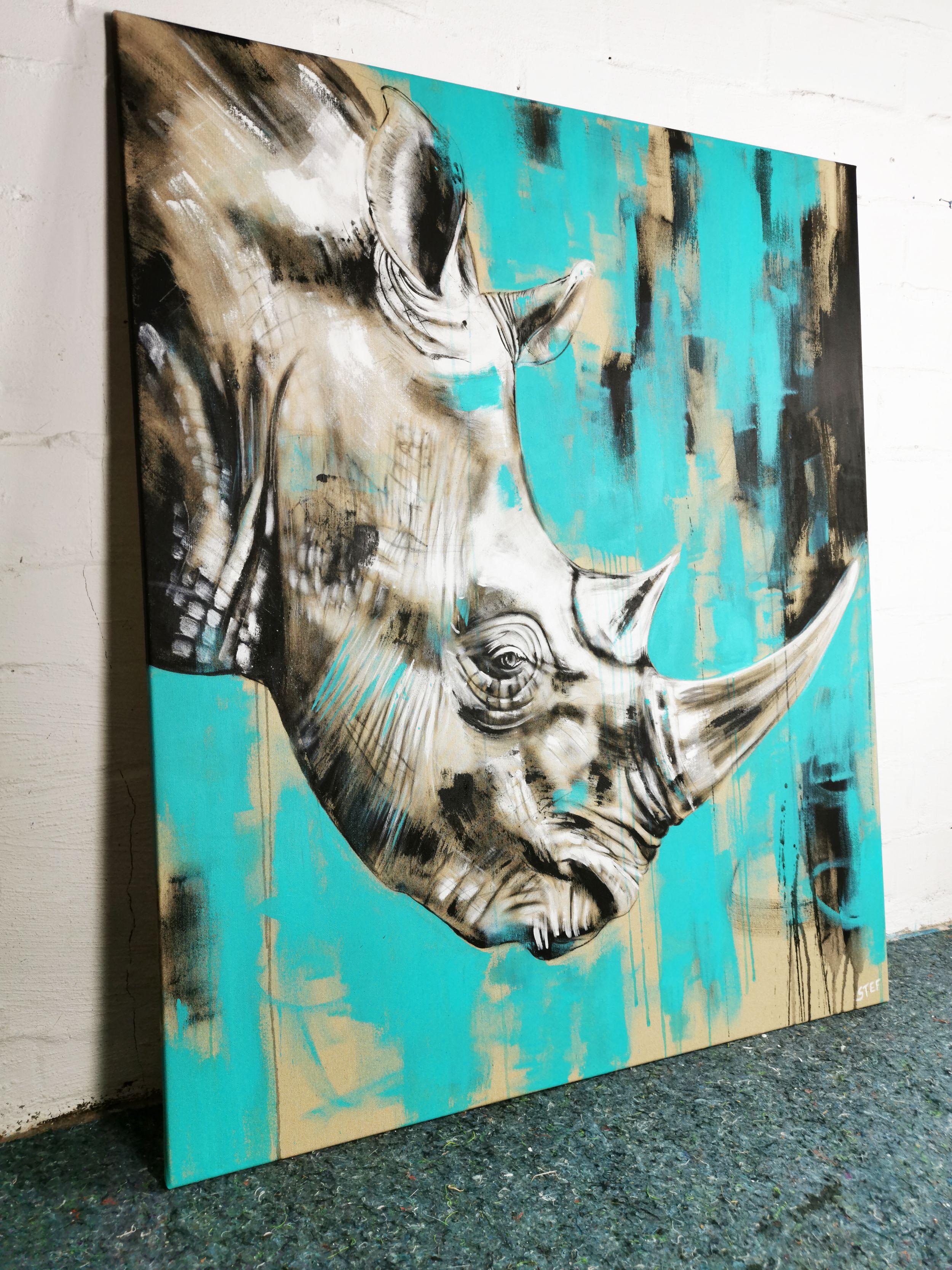 RHINO #5 is an expressive painting of a close up rhino head.    Splashing Colors in black, white and turquoise on raw canvas.  The monochrome color in combination with the soft tone of the canvas:    100 x 120 cm    â€žNo one in the world needs a