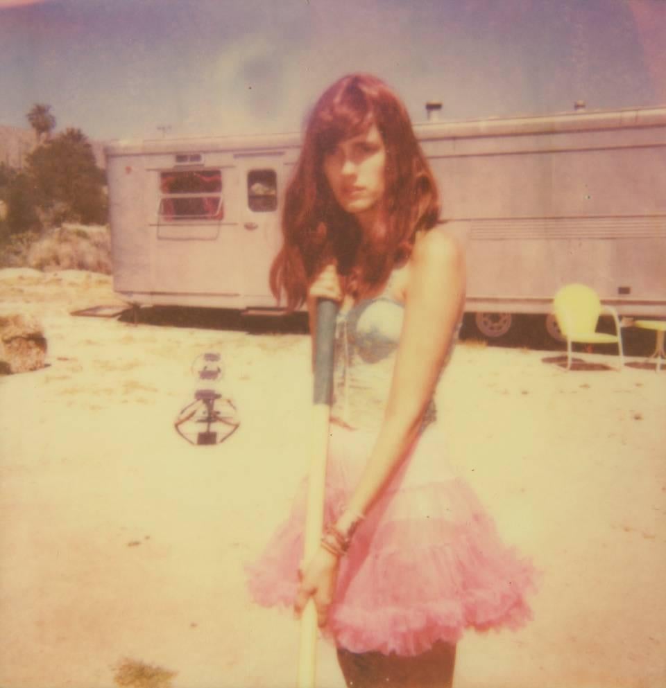 Stefanie Schneider Figurative Photograph - A lonely and deserted Place (The Girl behind the White Picket Fence) - Polaroid