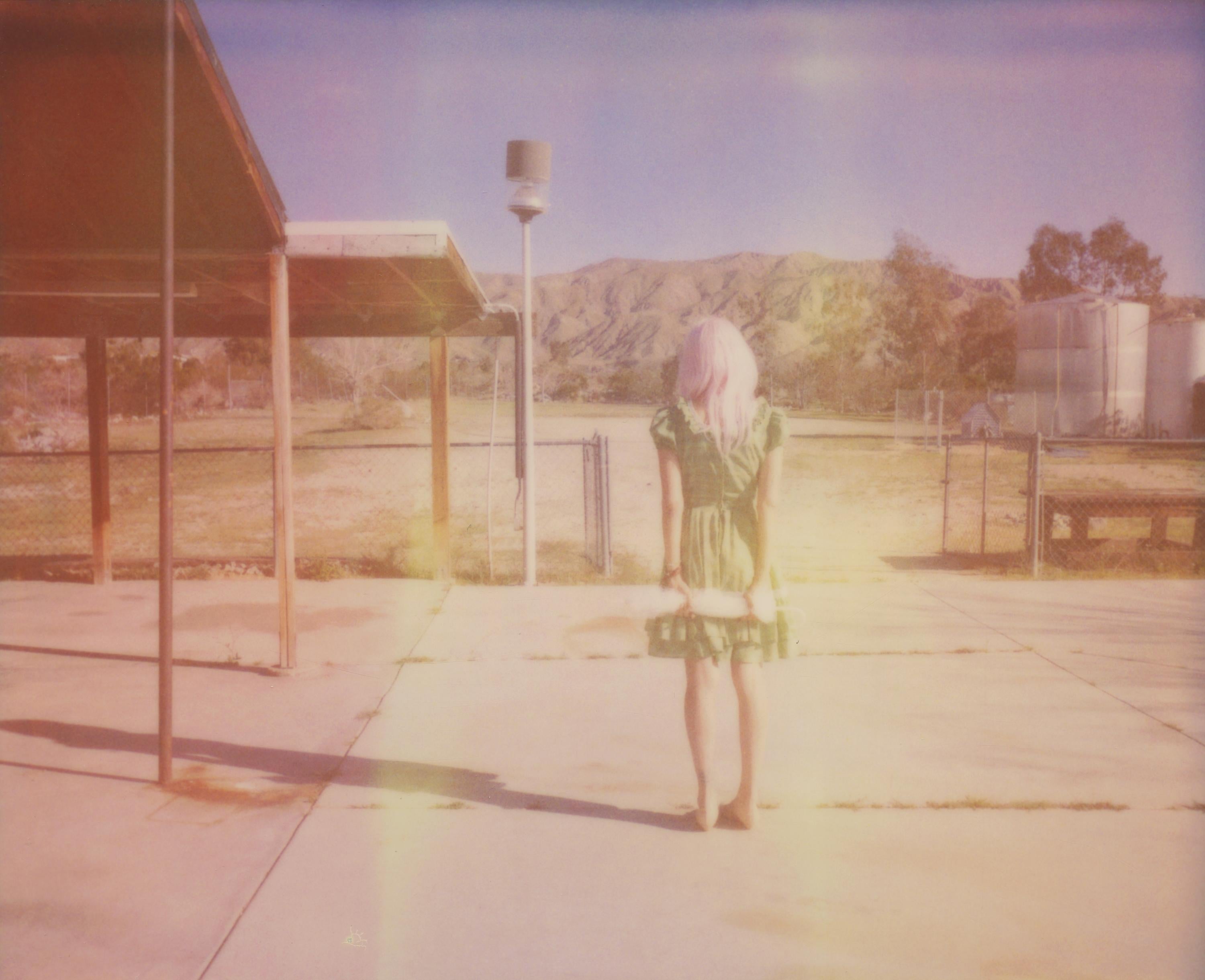 Stefanie Schneider Color Photograph - Await (The Girl behind the White Picket Fence) - Polaroid