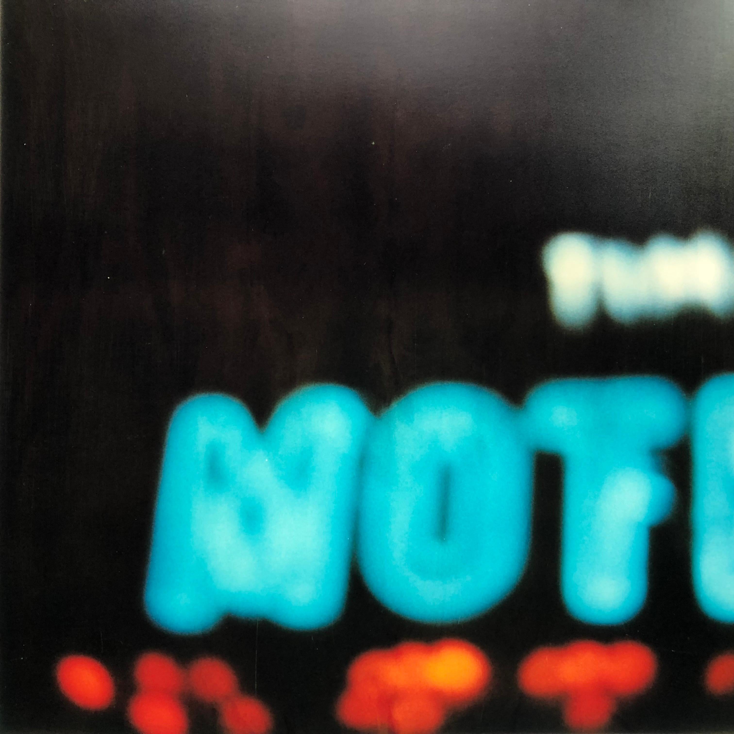 Bates Motel II - Contemporary, Neon, Urban, expired, Polaroid, analog - Black Color Photograph by Stefanie Schneider