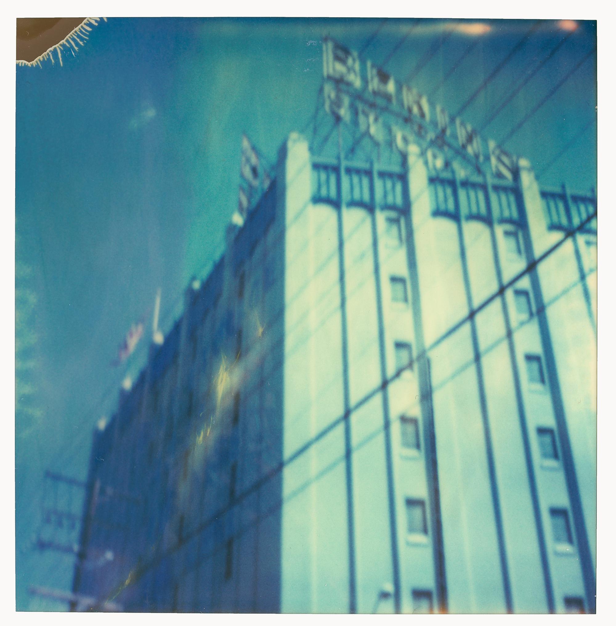 Stefanie Schneider Landscape Photograph - Bekins (analog) 60x70cm - Edition 1/10, mounted - Polaroid, 20th Century, Blue