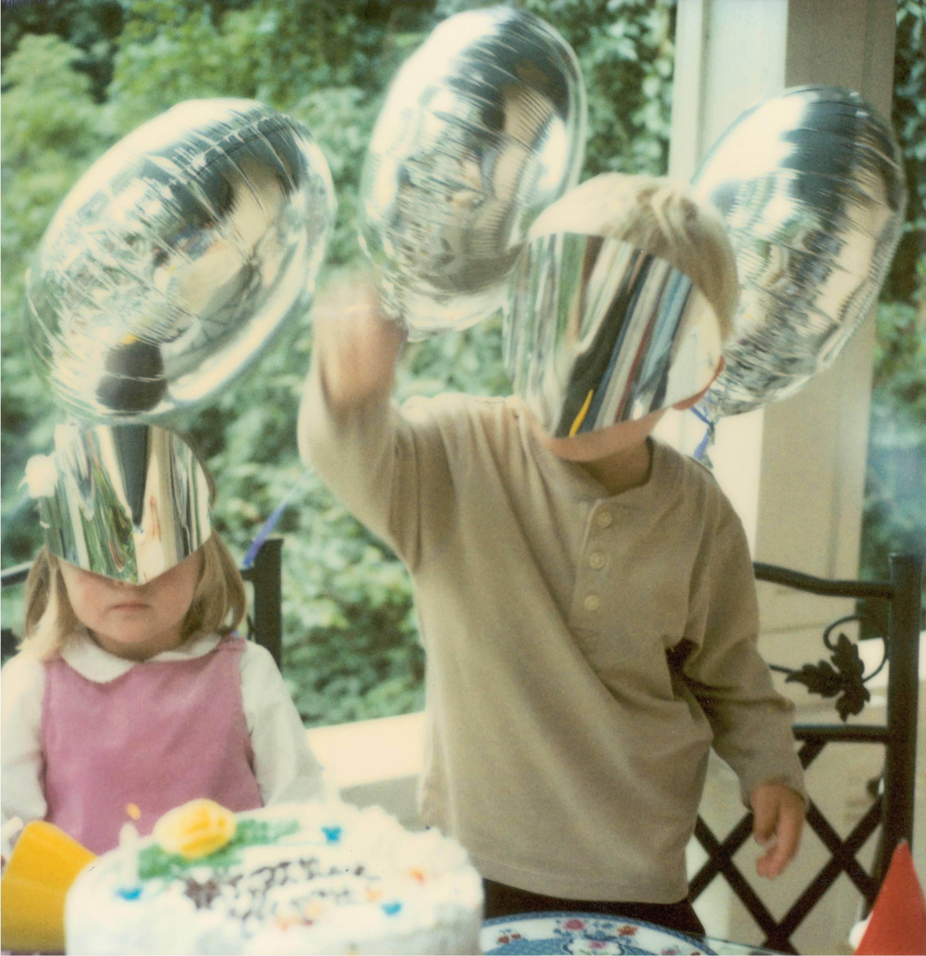 Stefanie Schneider Color Photograph - Boy with Silver Mask (Stay)