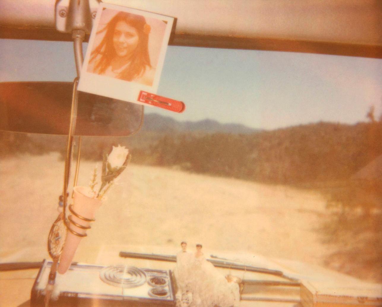 Stefanie Schneider Color Photograph - Dashboard Memories (The Girl behind the White Picket Fence) - Polaroid