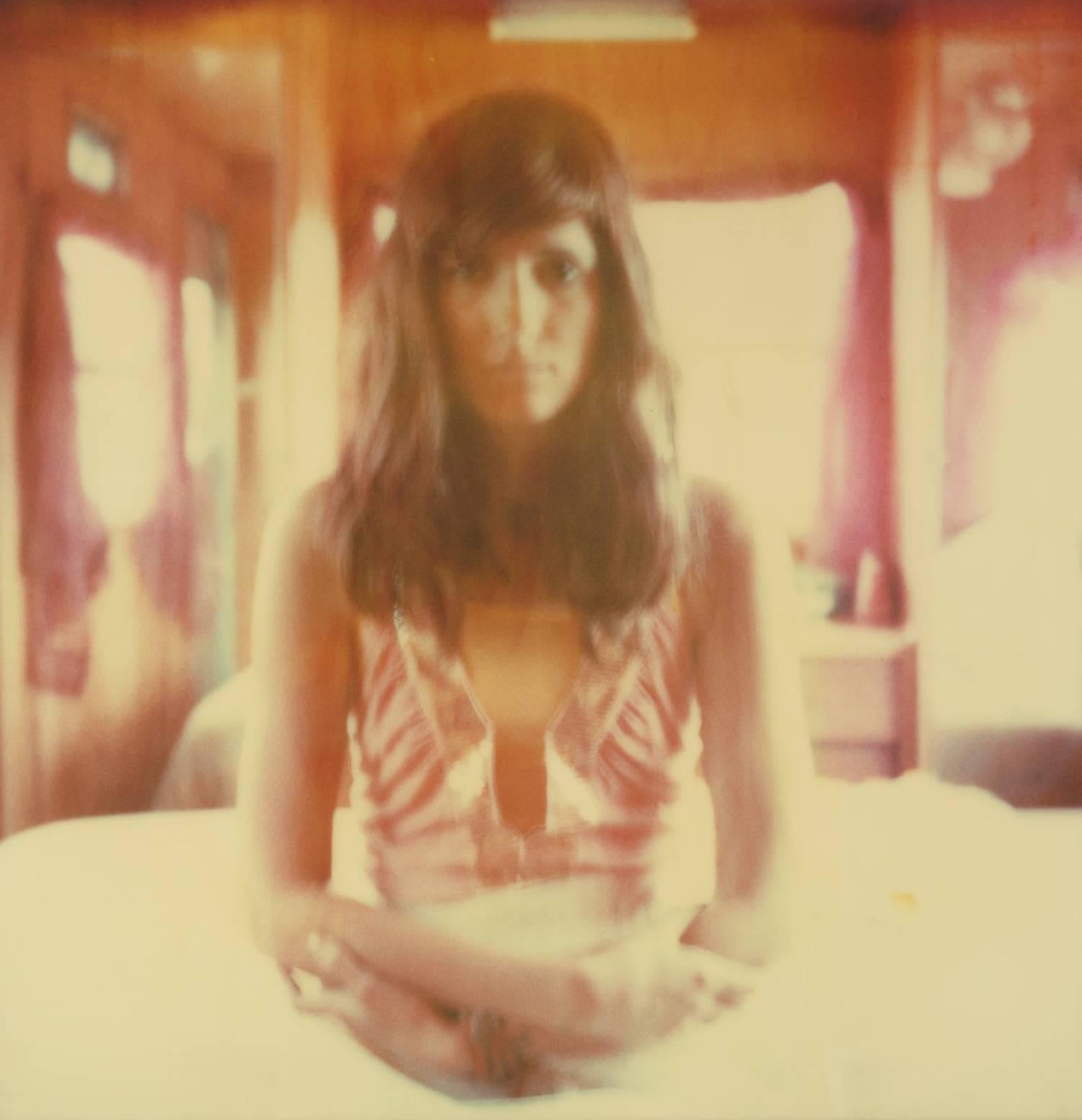 Gravity (The Girl behind the White Picket Fence) - Polaroid, Contemporary, Color - Photograph by Stefanie Schneider