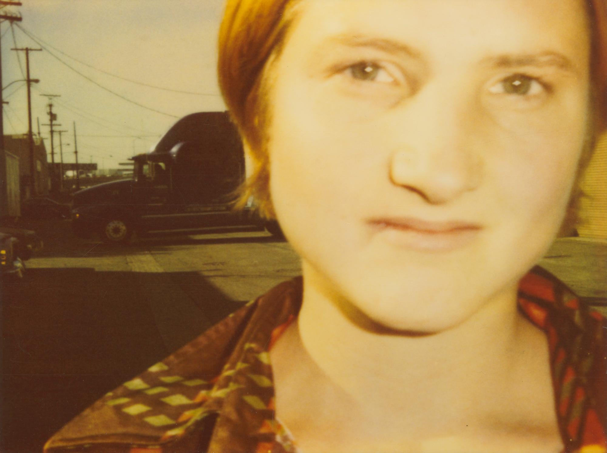 Stefanie Schneider Portrait Photograph - Kirsten in front of Charlie's house (California Blue Screen) - analog