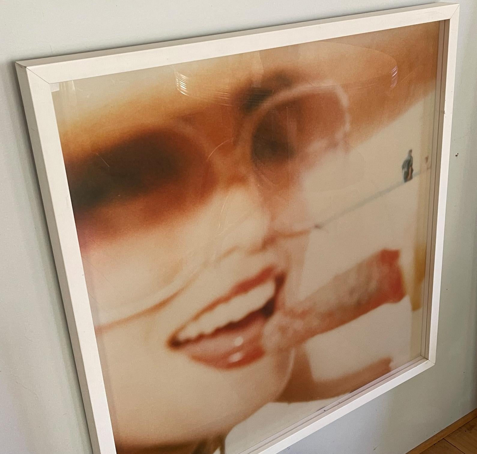 Lollipop I (Beachshoot) starring Radha Mitchell - framed, analog, Polaroid - Beige Portrait Photograph by Stefanie Schneider