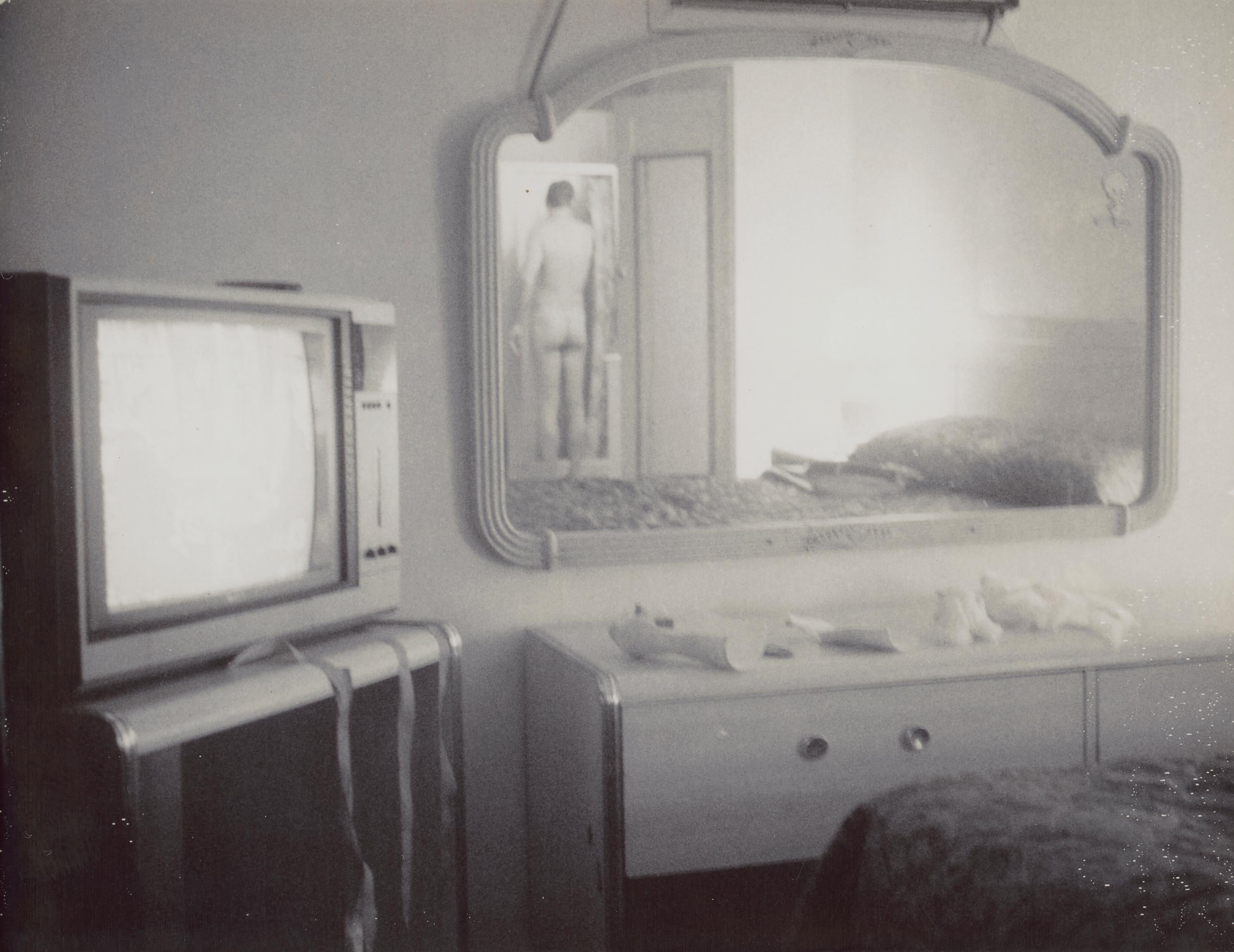 Stefanie Schneider Black and White Photograph - Male Nude in Motel II (29 Palms, CA) Unique Polaroid - Contemporary