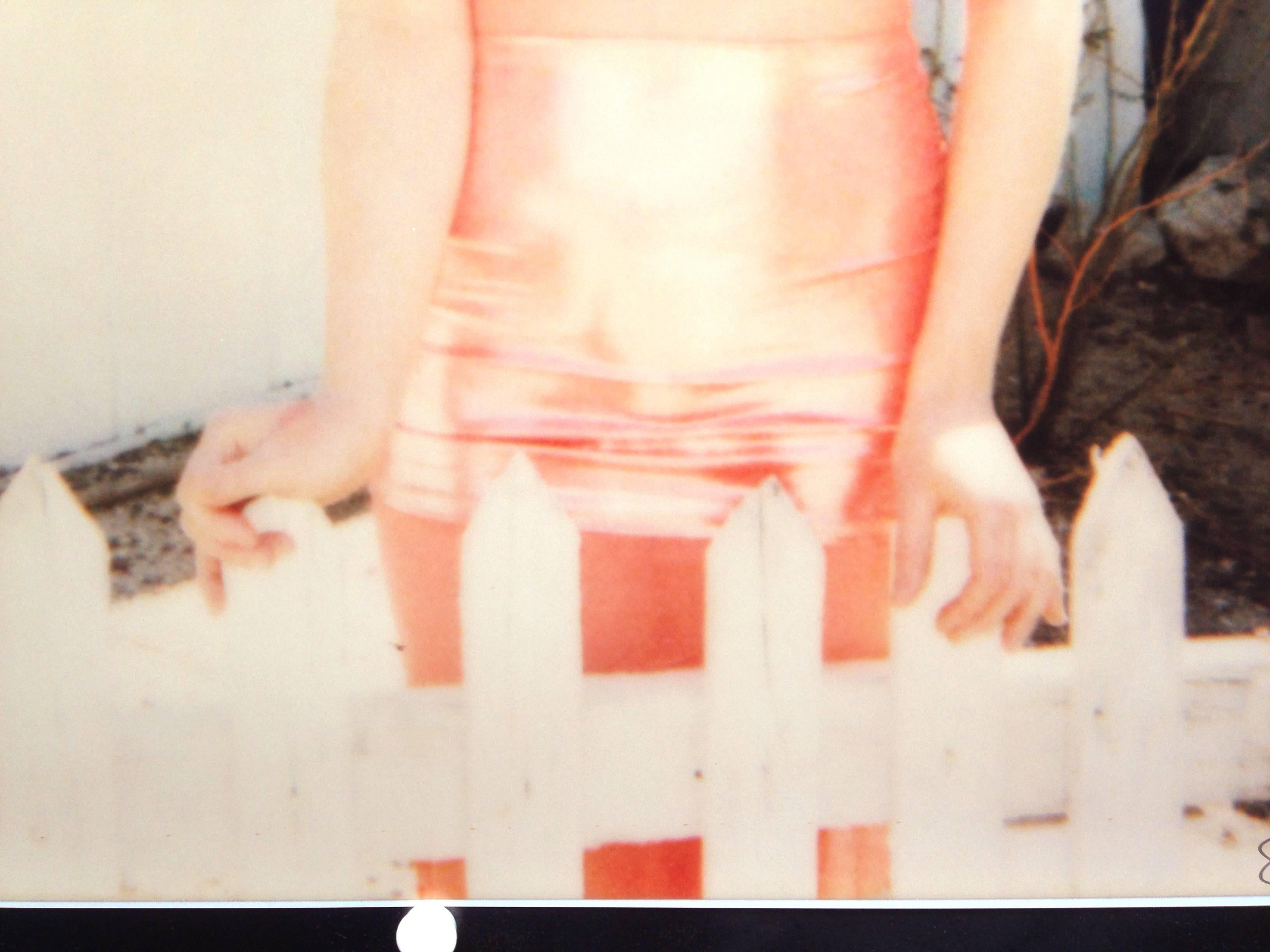 Max by the Fence - d'après un original Polaroid - Épreuve - Beige Portrait Photograph par Stefanie Schneider