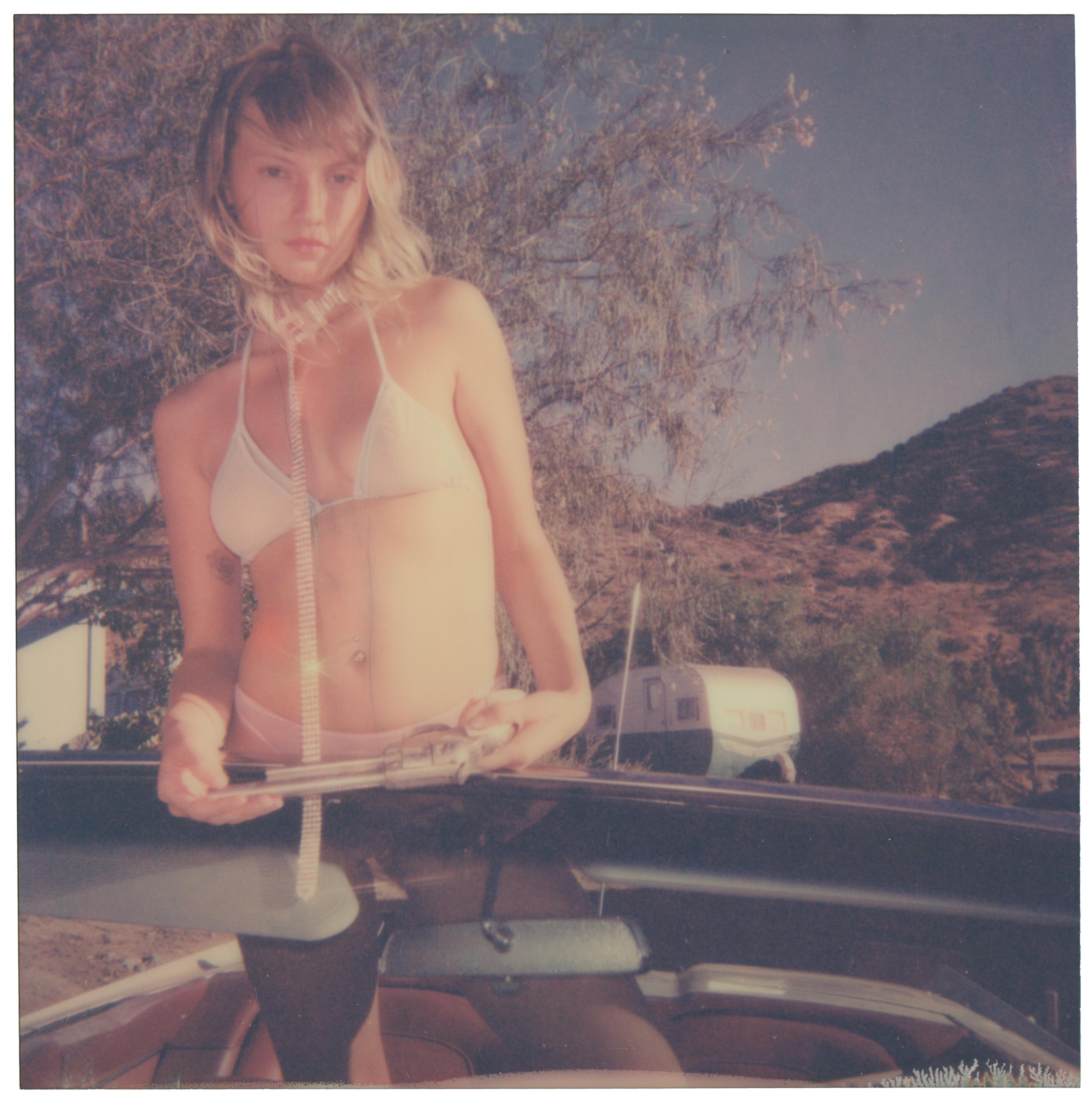 Stefanie Schneider Portrait Photograph - Nastasia with Gun - Polaroid, Contemporary, Color