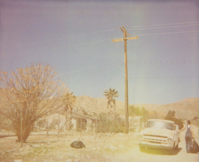 Stefanie Schneider Landscape Photograph - North Star Trail (The Girl behind the White Picket Fence) - Polaroid, Color