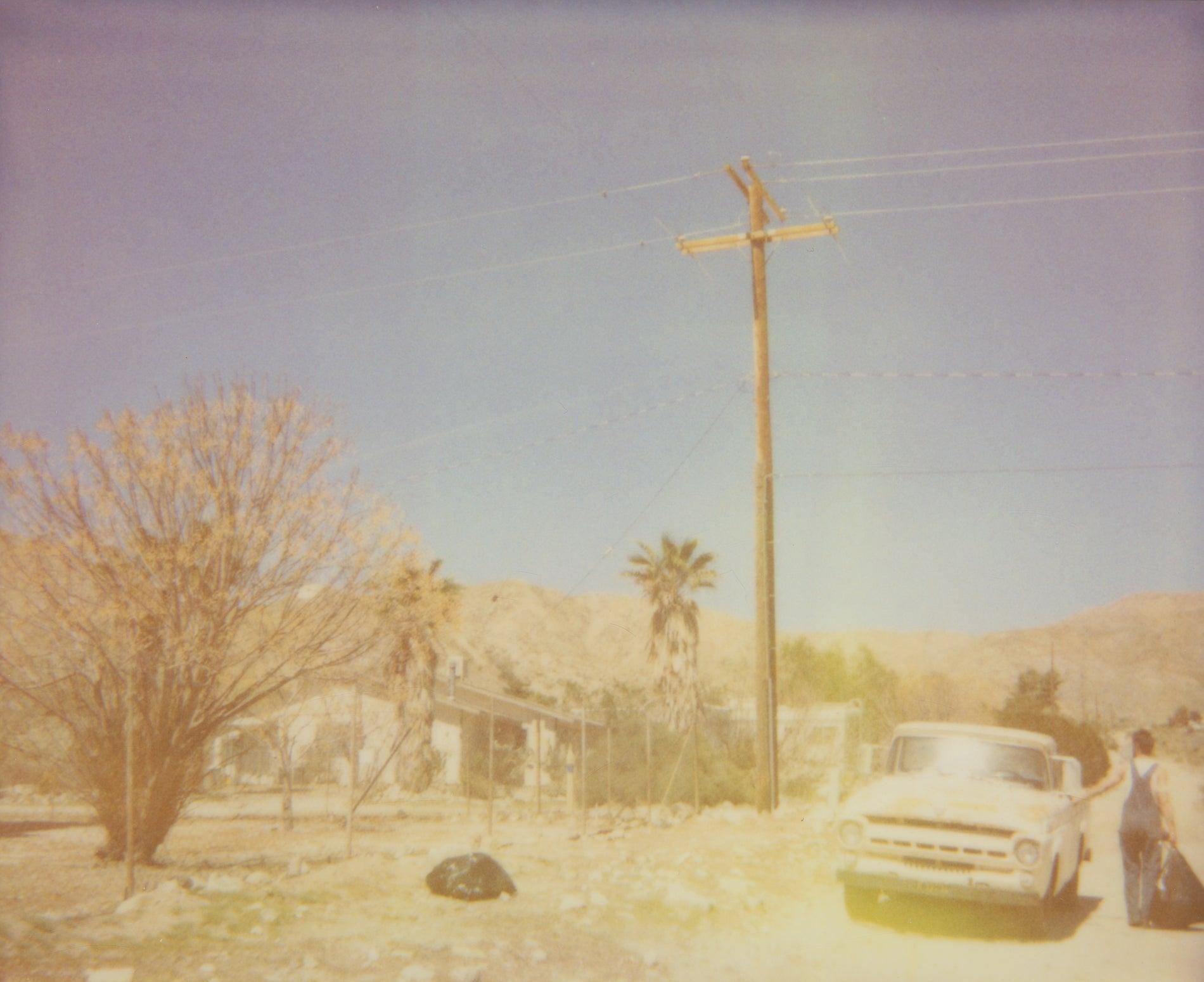 Stefanie Schneider Color Photograph - North Star Trail (The Girl behind the White Picket Fence) - Polaroid, Color