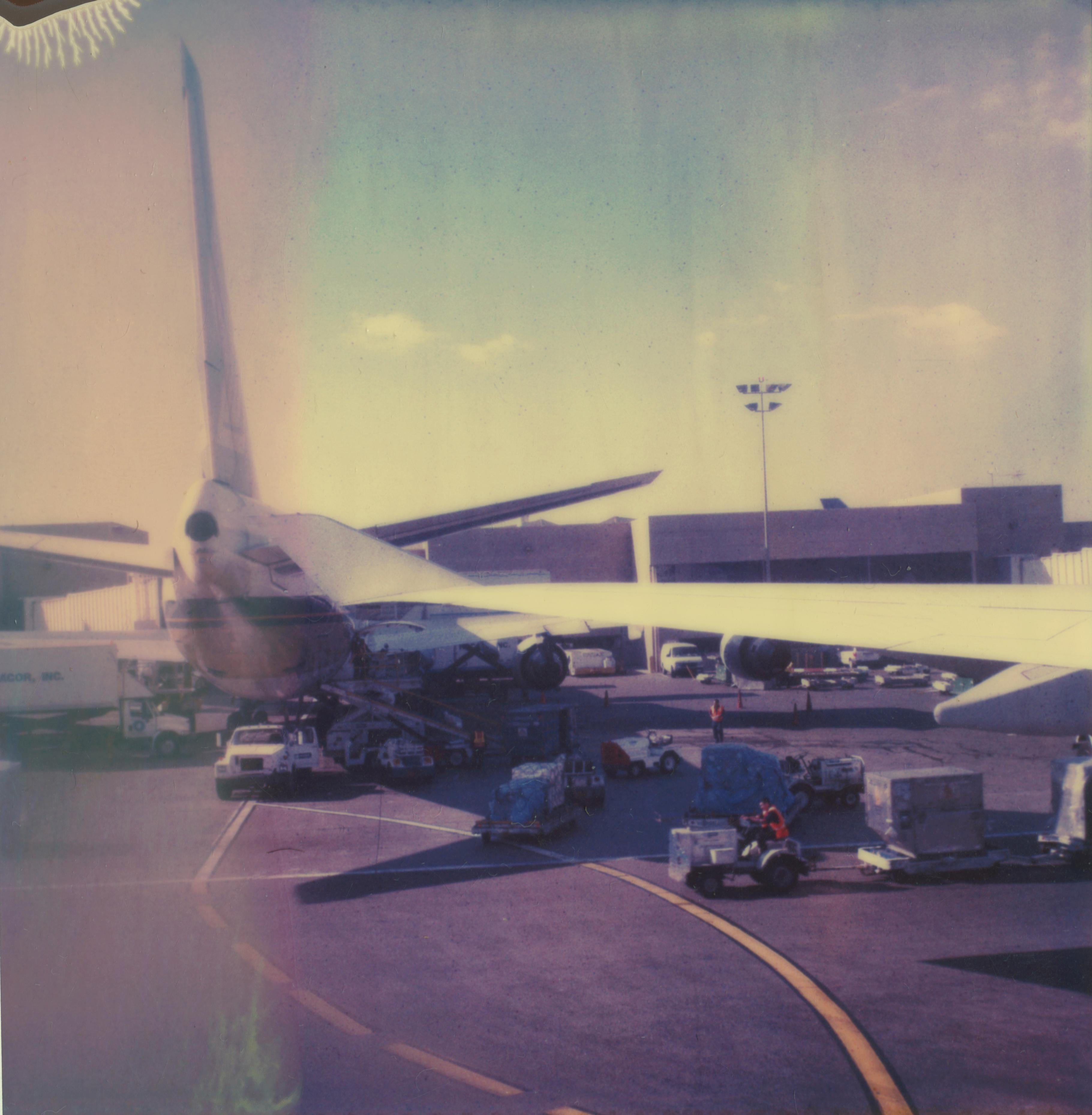 Stefanie Schneider Color Photograph – Plane Tarmac (Stranger than Paradise)