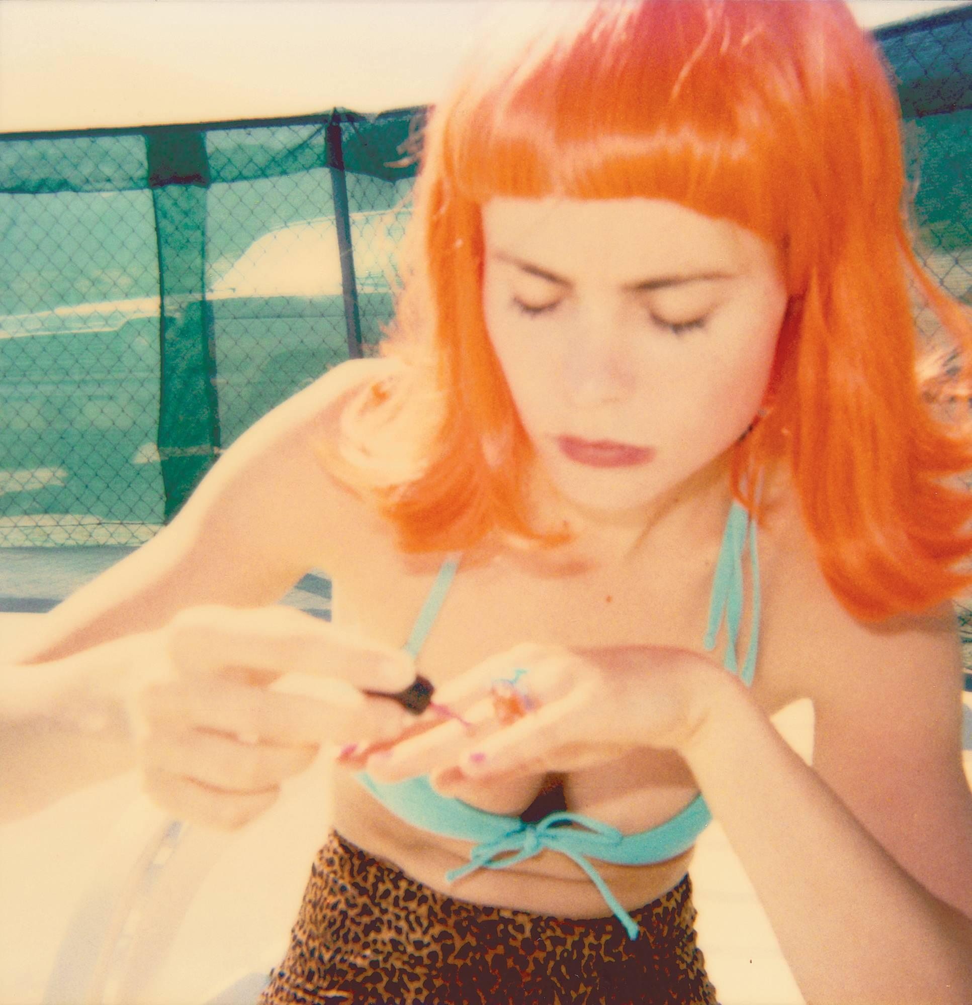 Stefanie Schneider Portrait Photograph - Radha doing her Nails by the Pool (29 Palms, CA) - Contemporary, Polaroid, Women