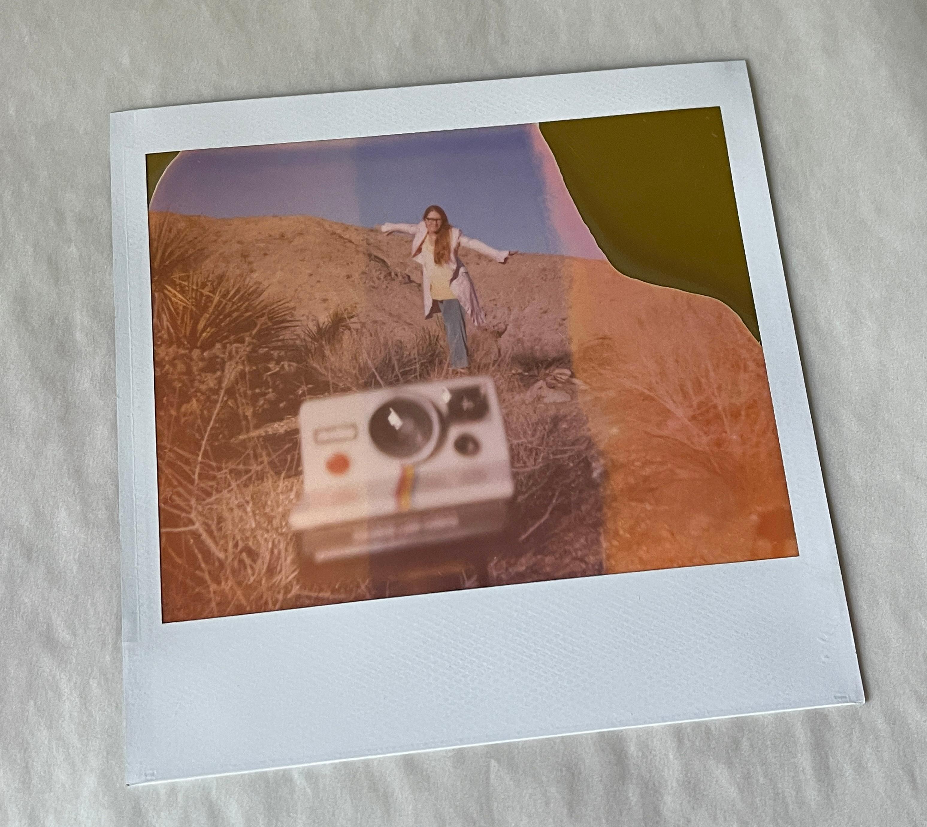 Stefanie Schneider Color Photograph - Self Portrait on Polaroid Camera - Happy New Year 2013 - Unique Piece