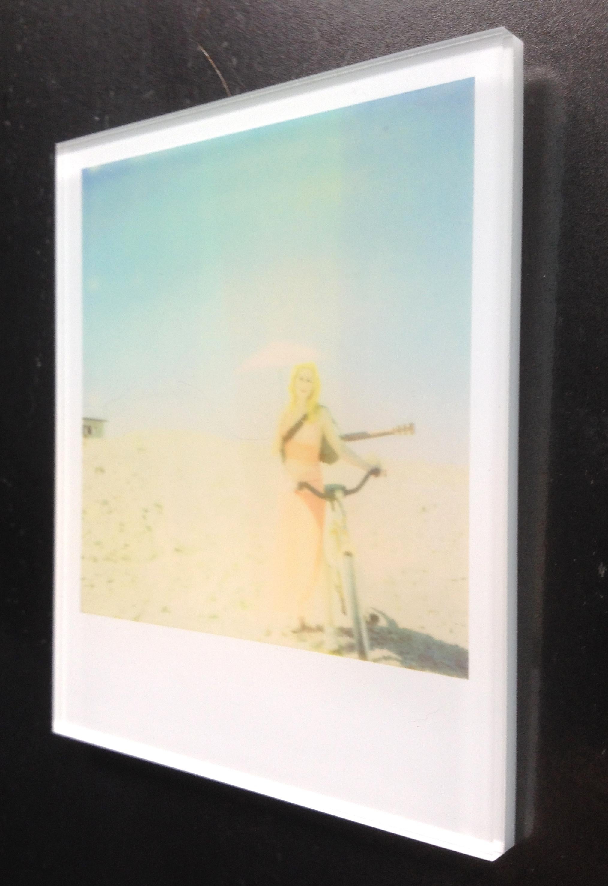 Stefanie Schneider's Minis
'Moonwalk' (29 Palms, CA), 2006
signed and signature brand on verso
Lambda digital Color Photographs based on a Polaroid

Polaroid sized open Editions 1999-2013
10.7 x 8.8cm (Image 7.9x7.7cm)
mounted: sandwiched in between