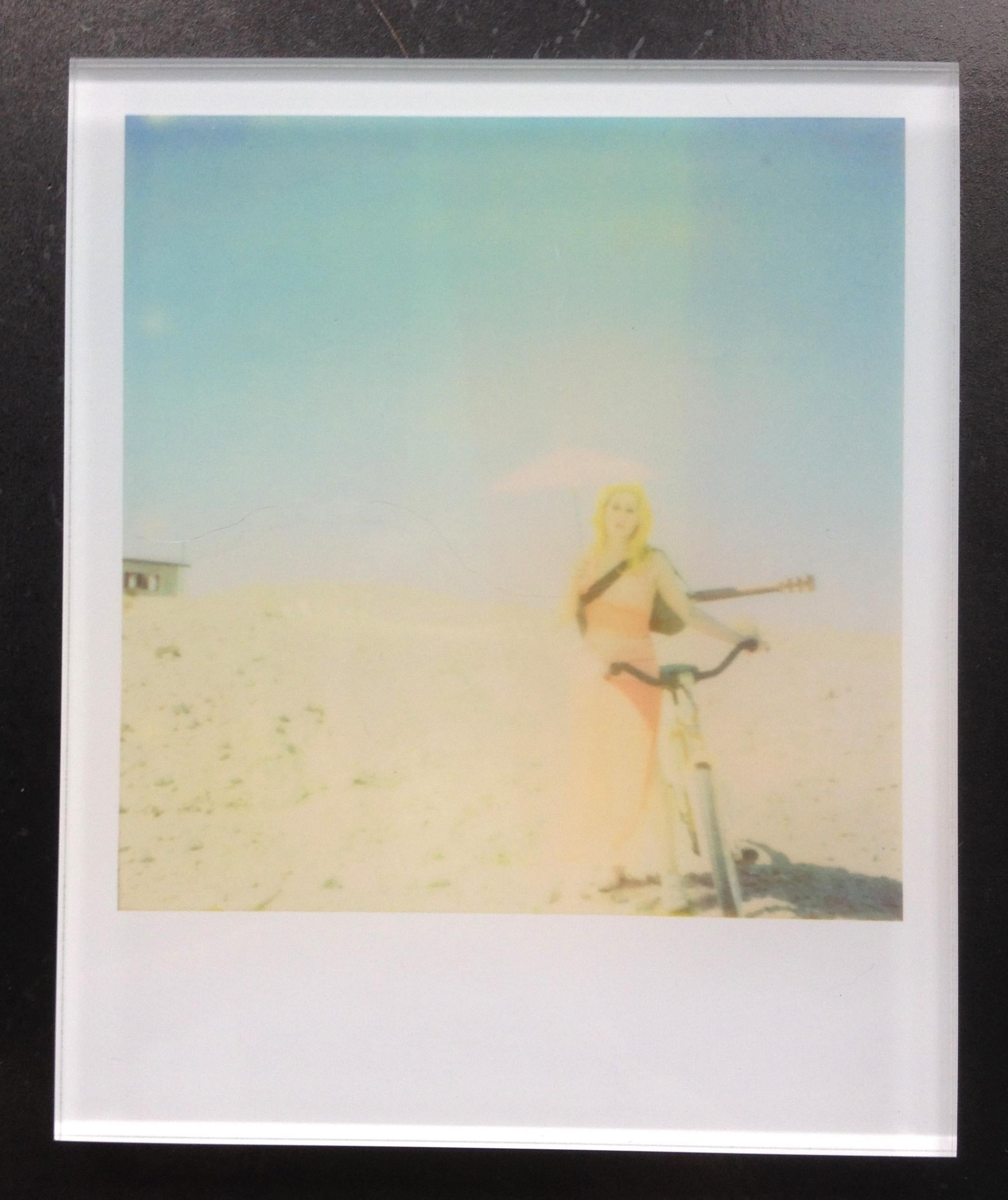 Stefanie Schneider's Minis
'Moonwalk' (29 Palms, CA), 2006
signed and signature brand on verso
Lambda digital Color Photographs based on a Polaroid

Polaroid sized open Editions 1999-2013
10.7 x 8.8cm (Image 7.9x7.7cm)
mounted: sandwiched in between