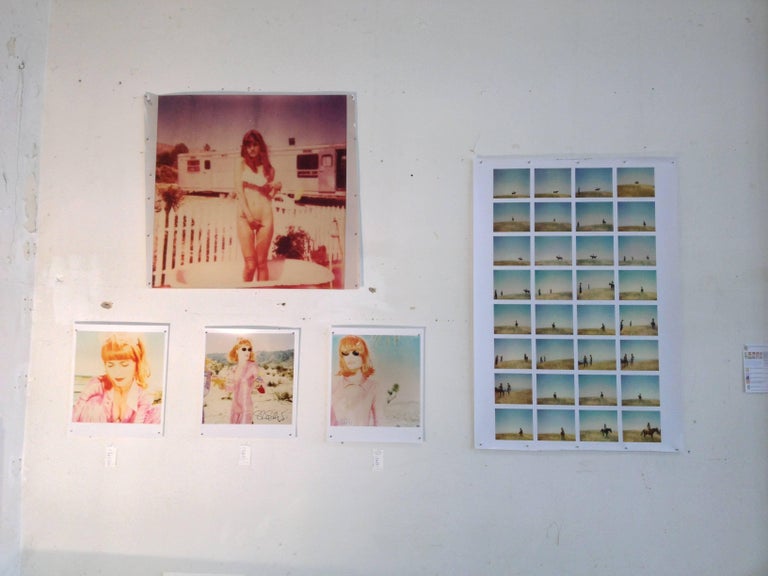 The Girl II (Behind the White Picket Fence) - based on a Polaroid, analog, color - Photograph by Stefanie Schneider