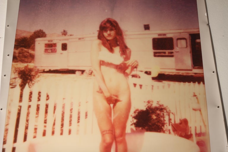The Girl II (Behind the White Picket Fence) - based on a Polaroid, analog, color - Contemporary Photograph by Stefanie Schneider
