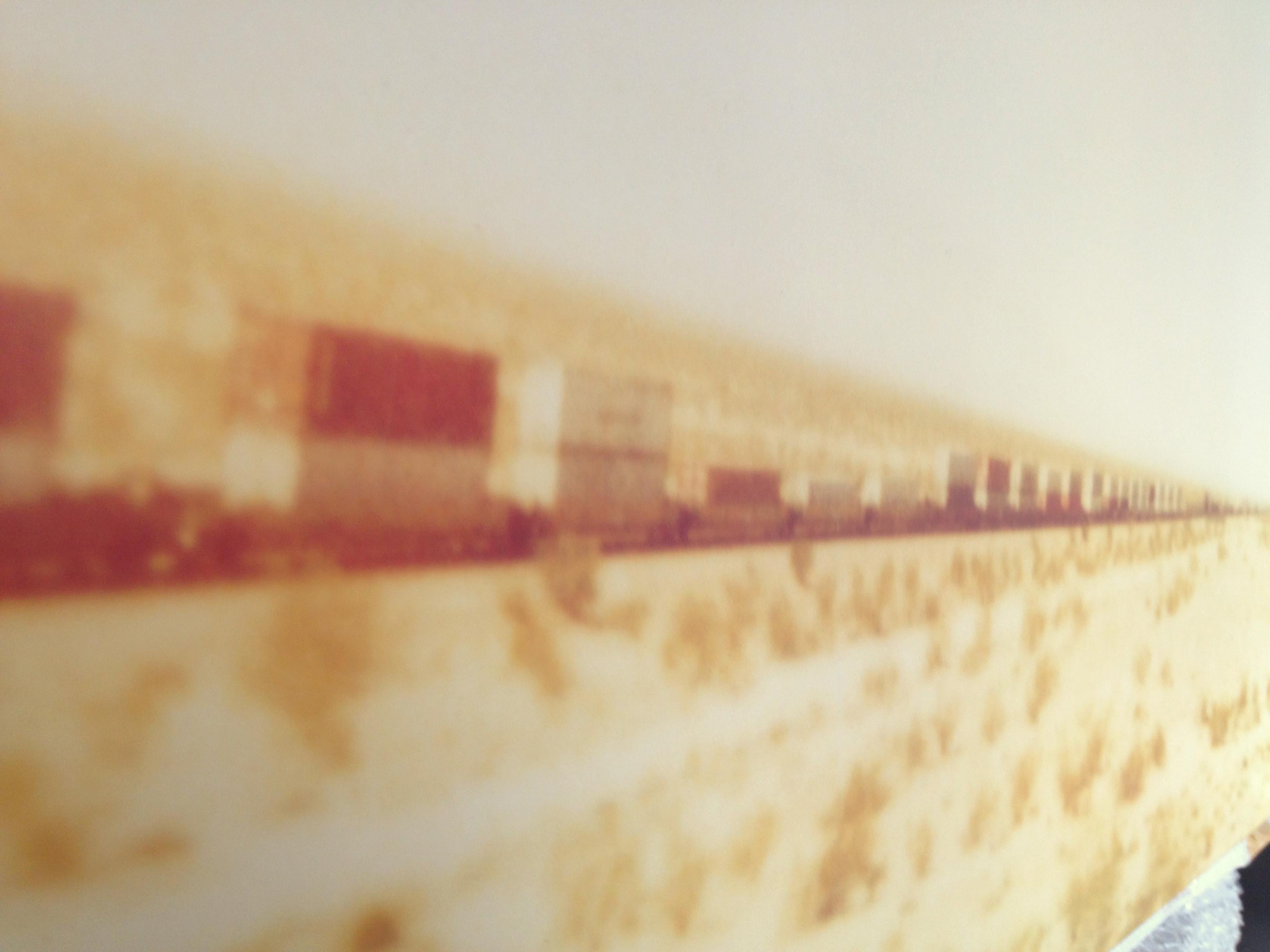 Train crosses Plain (Wastelands) - analog hand-print, mounted - Polaroid, Color For Sale 1