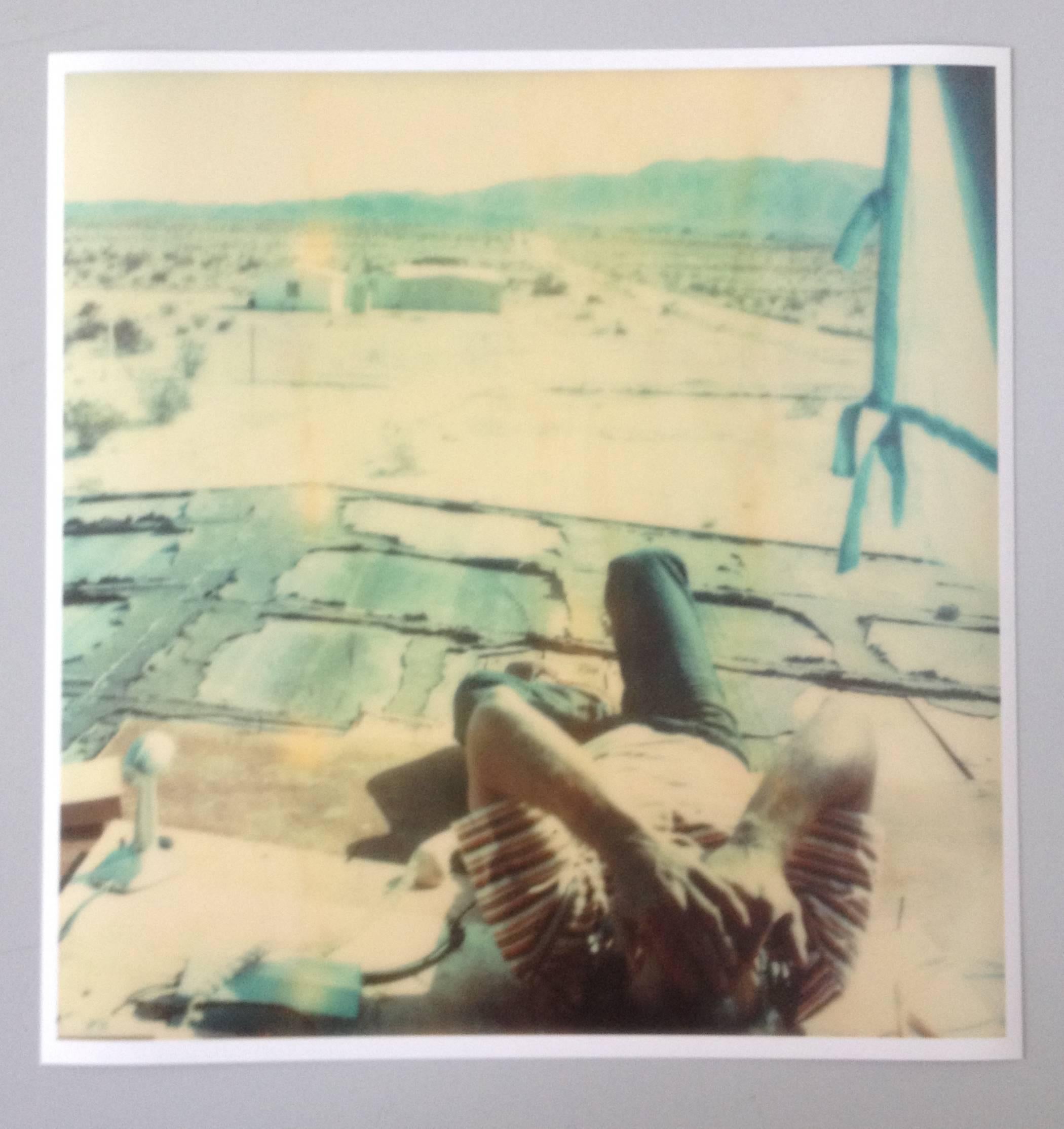 'Wonder Valley View' (The Girl behind the White Picket Fence) - 2013, 

20x20cm, Edition 8/10, 
digital C-Print based on a Polaroid, 
Certificate and Signature label,
Not mounted

Stefanie Schneider lives and works in the High Desert of Southern