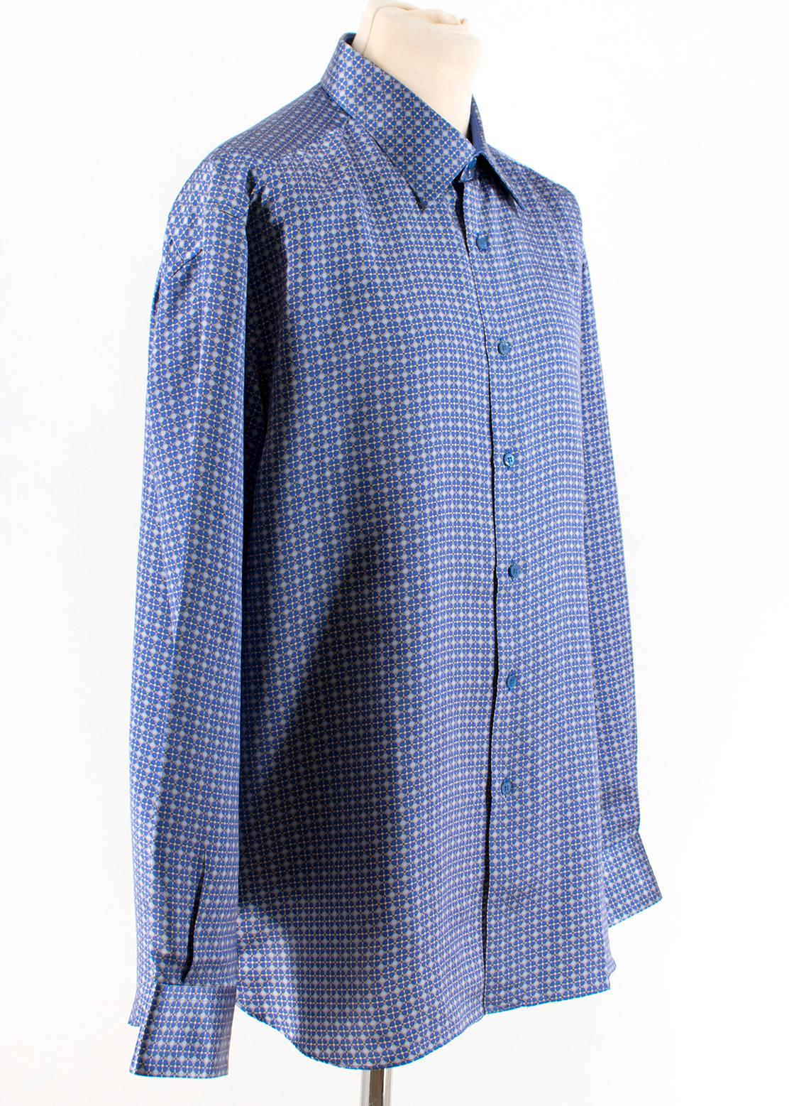 Stefano Ricci Blue Print Silk Shirt 

- Blue Print Patterned Shirt 
- 100% Silk 
- Stiff point collar and sleeves 
- Blue buttoned down center front and sleeves 

Please note, these items are pre-owned and may show some signs of storage, even when
