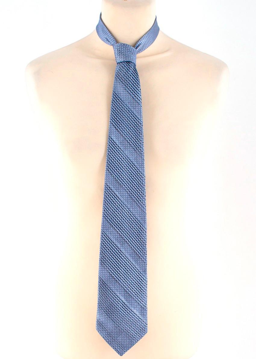 Stefano Ricci Blue Printed Pleated Silk Tie
 
 - Blue printed tie
 - Pleated
 - 100% silk
 
 Please note, these items are pre-owned and may show some signs of storage, even when unworn and unused. This is reflected within the significantly reduced