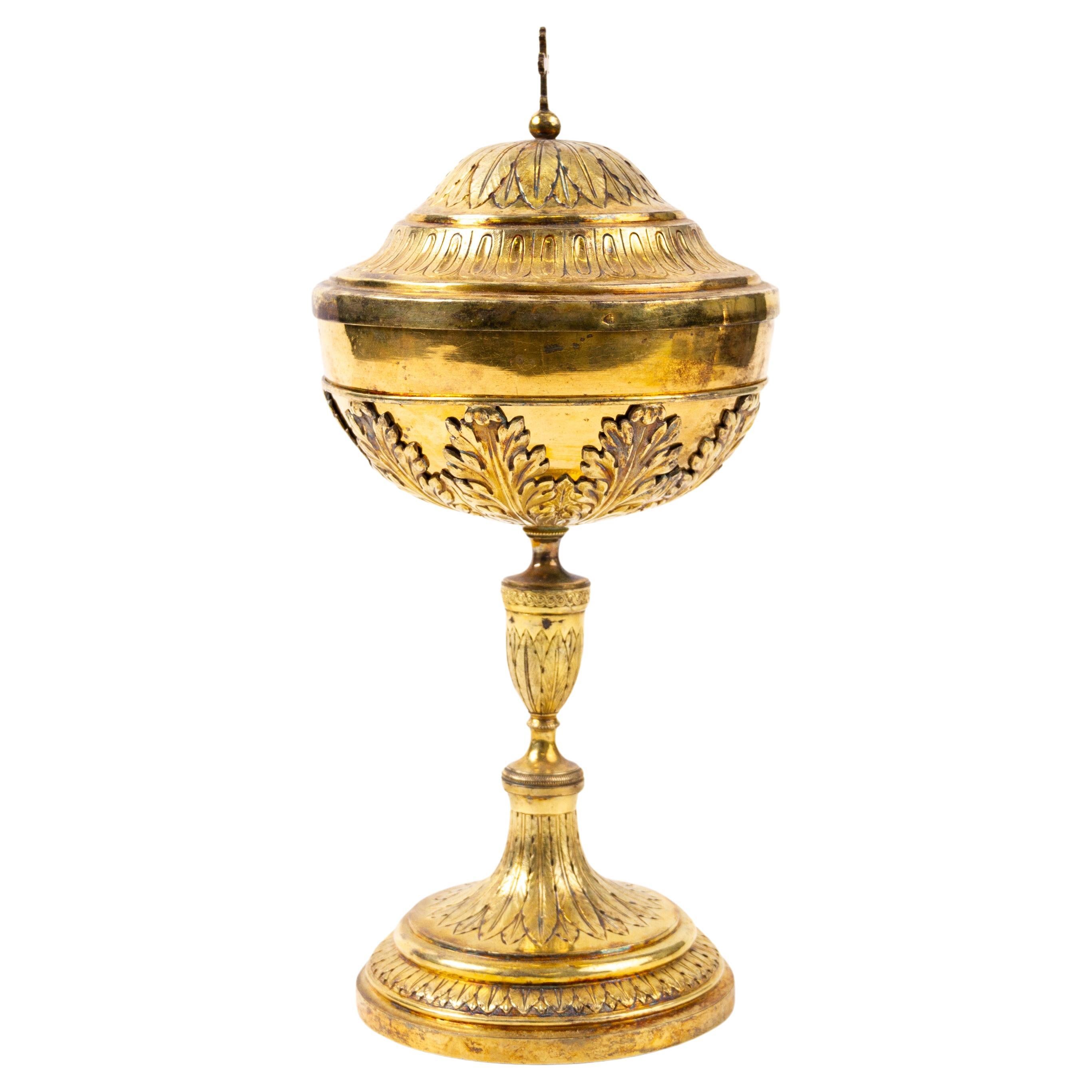 Stefano Sciolet II (ca. 1830 Rome) 889 Silver Gilt Ciborium with Papal Marks

Good condition

Original mercury-gilt solid 889 silver pyx. Work by master silversmith Stefano Sciolet II with workshop in Rome from 1826 to 1870. The pyx bears the