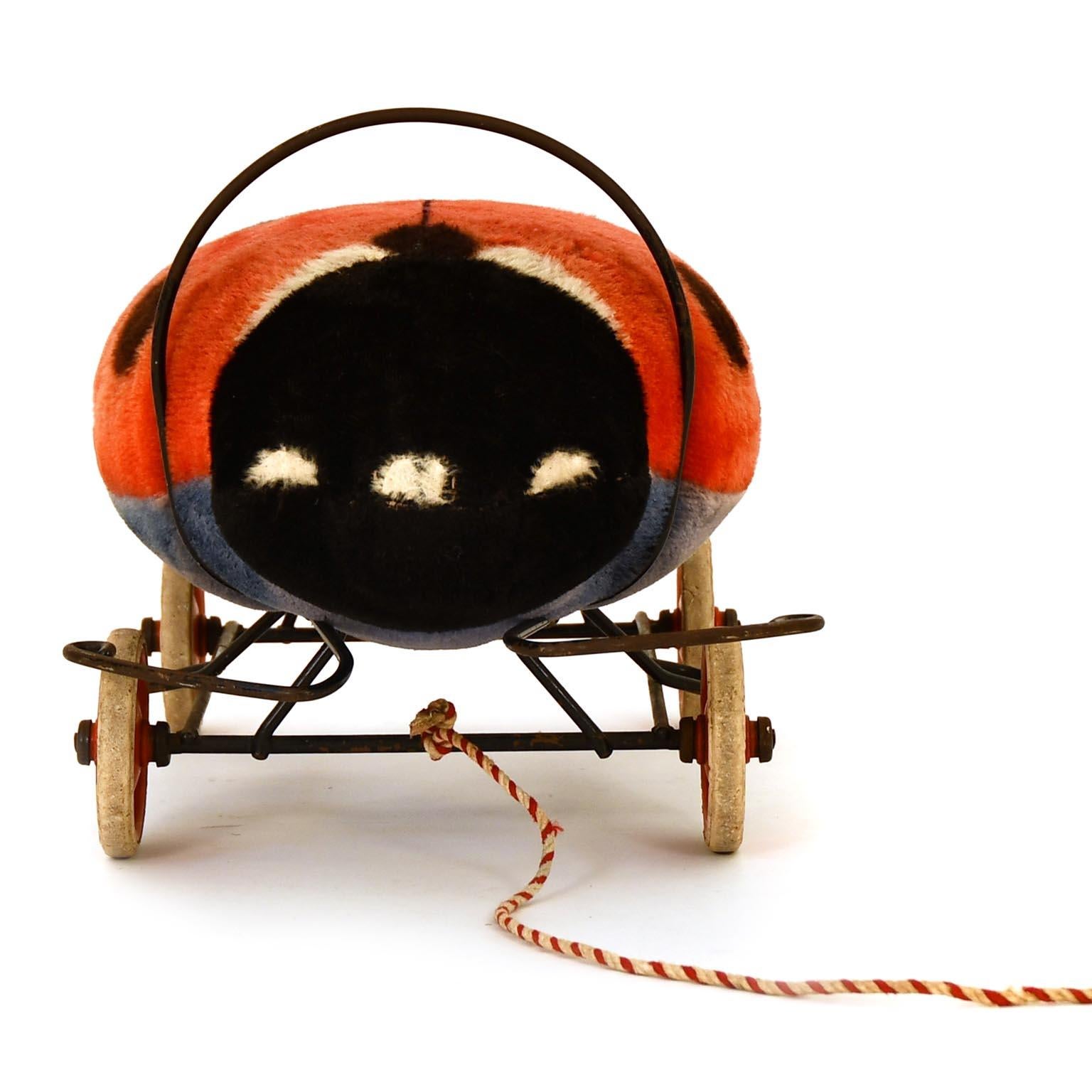 If you like to have a friend in your room, even you are not anymore a child. This cute Ladybird made by Margarete Steiff will be perfect for you. Just sit down, or if you can and like move through your rooms.
The ladybird is fixed on a metal base