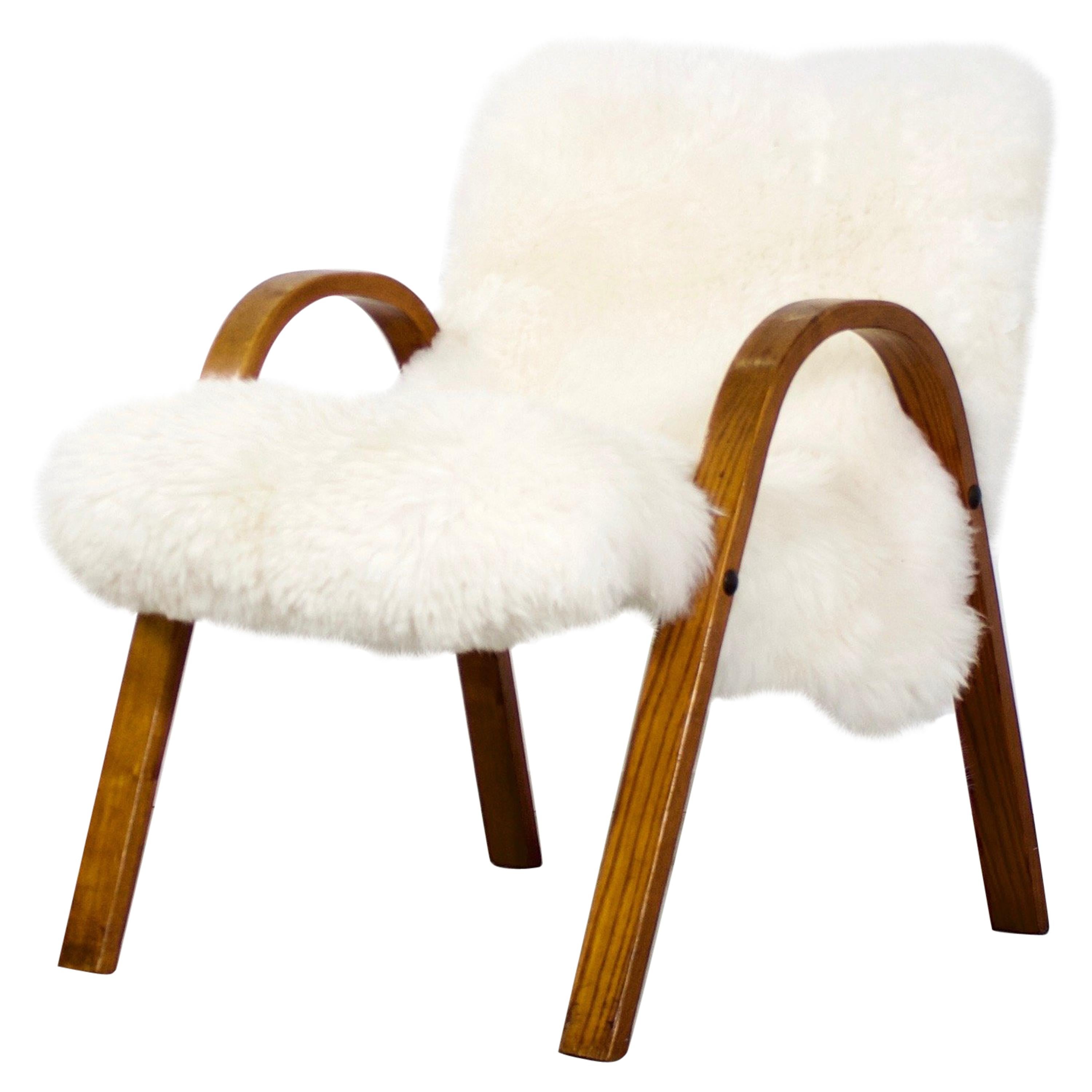 Chaise en bois avec arceau en peau de mouton Steiner:: 1948:: France