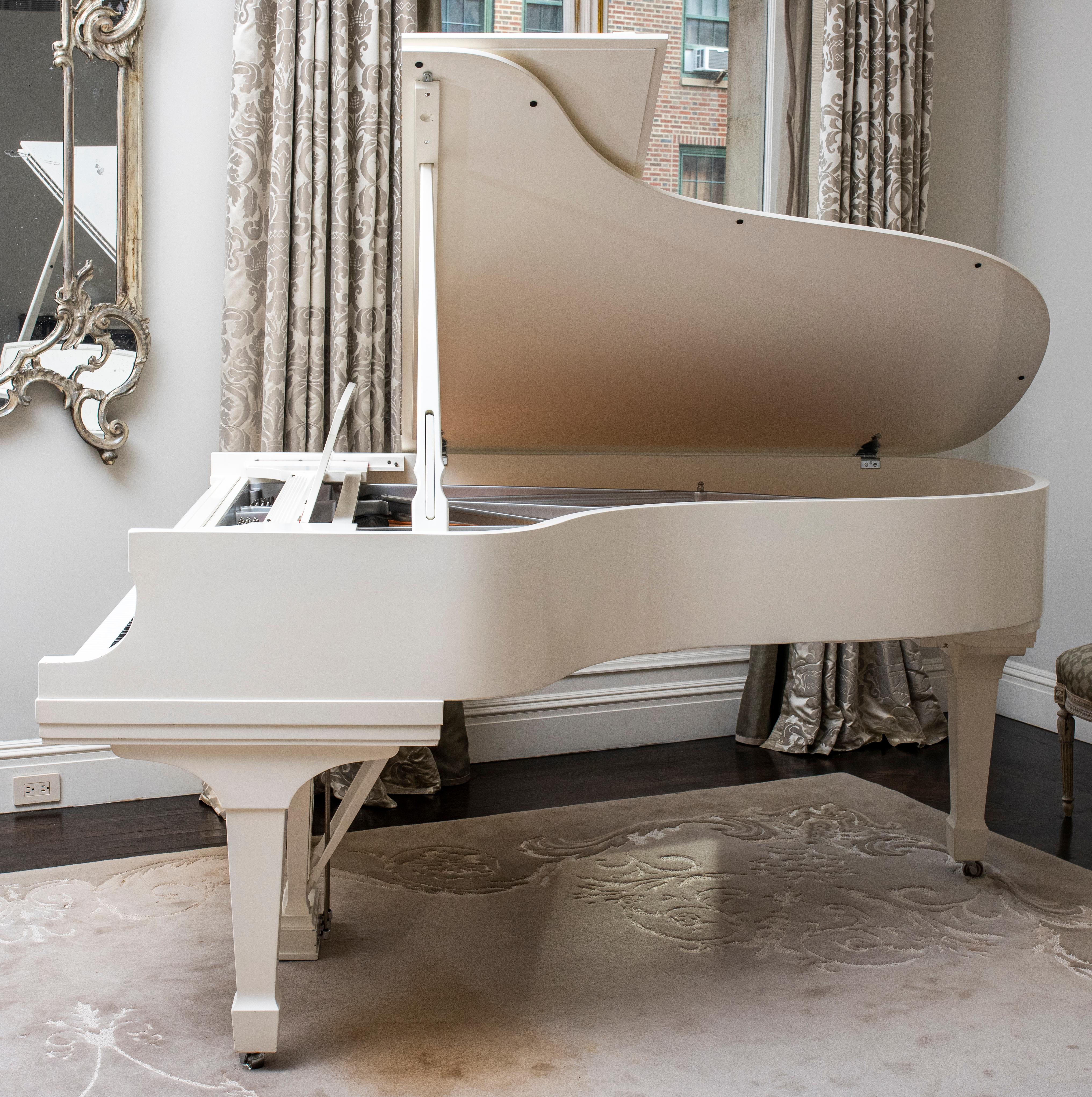 Manufactured in 2006, this Steinway & Sons 'Steinway B' grand piano in white lacquer is the perfect modern and unique talking point in any space. The piece is marked with serial number 576243, and is in great condition.