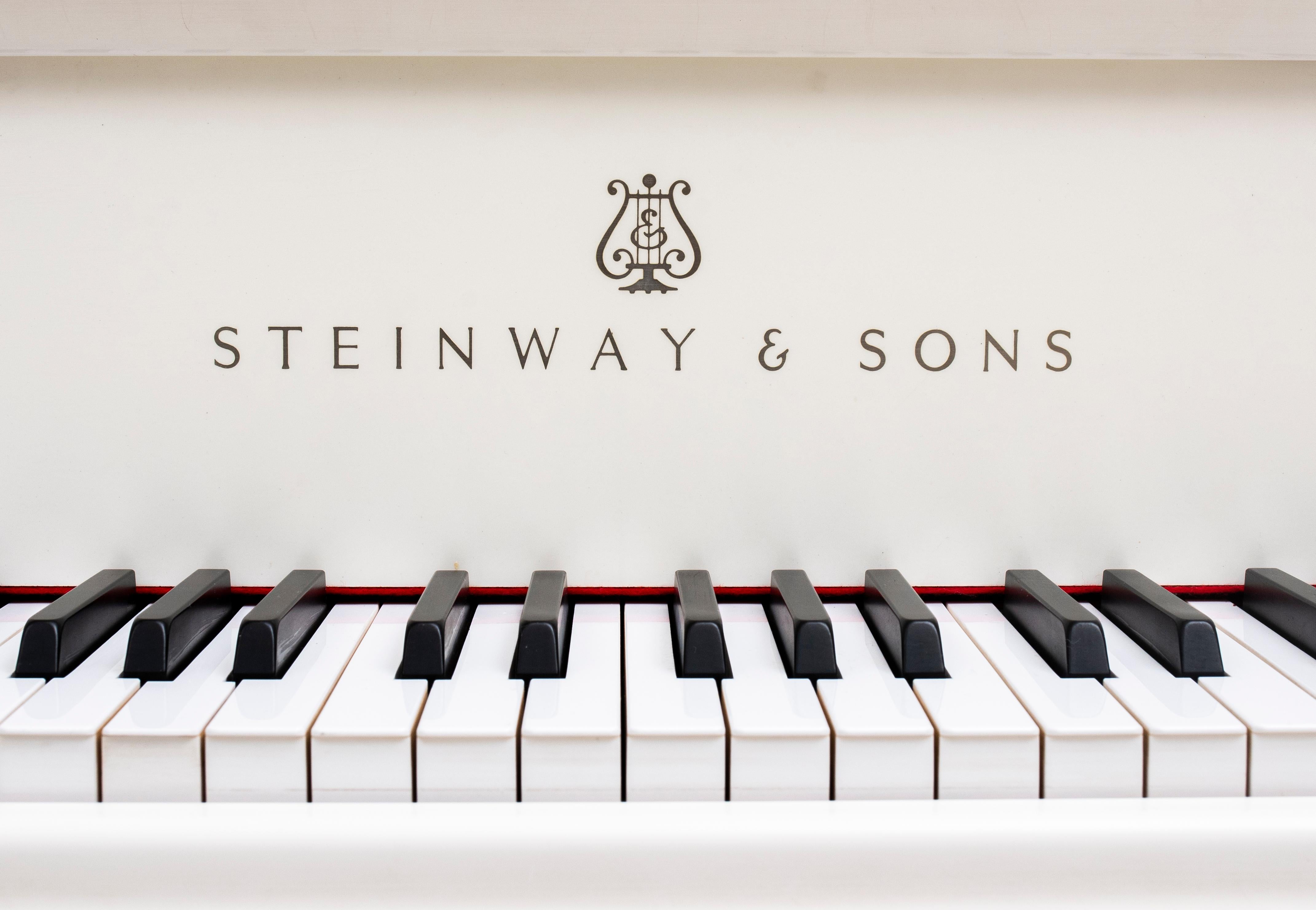 white steinway grand piano