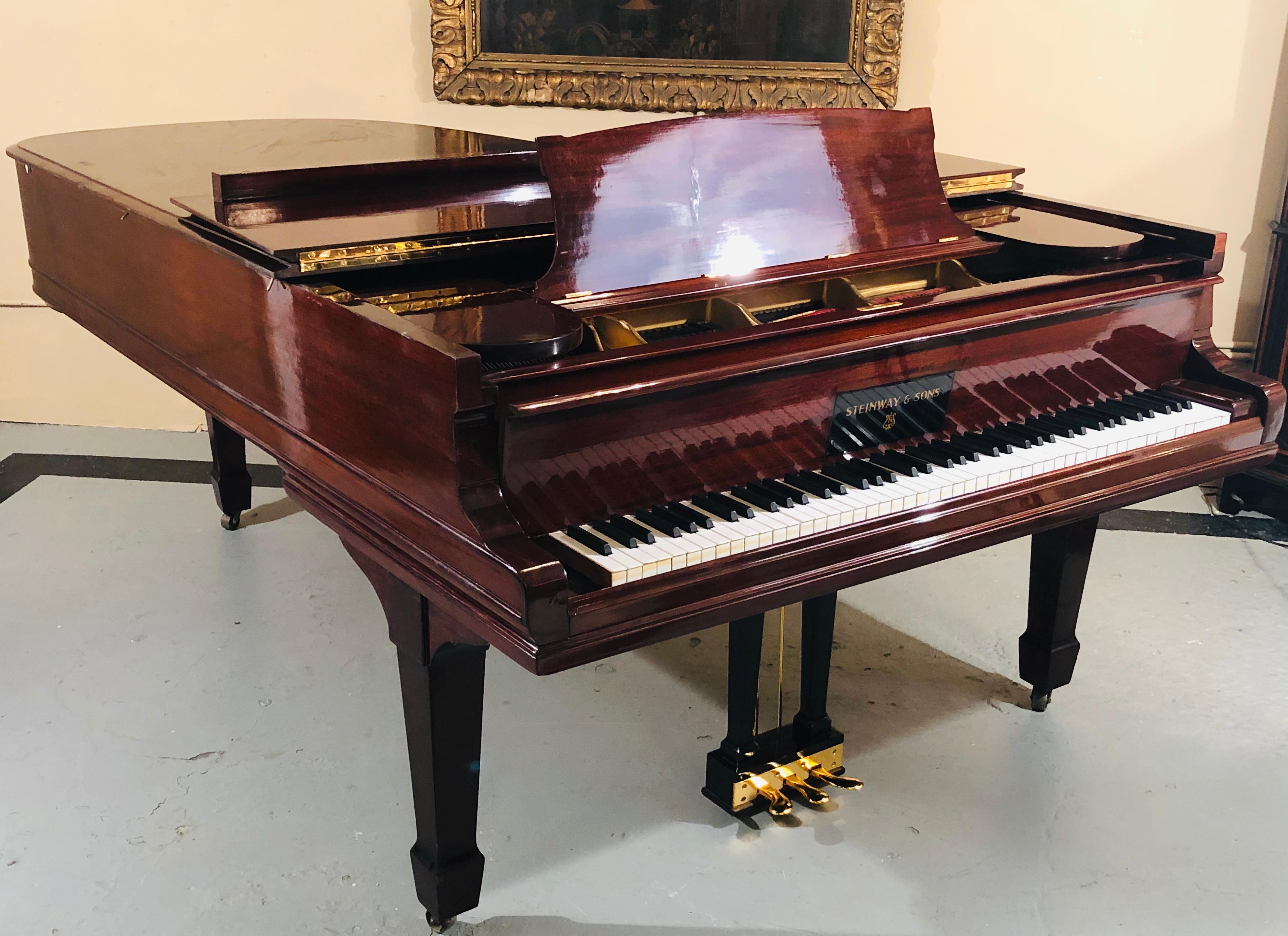 Steinway Model B Classic Grand Piano 1901 in a fully refinished mahogany case with polished brass. This finely refinished and partially rebuilt Steinway Piano is a Model B and left the Steinway Piano Workshop on September 2, 1901. The soundboard