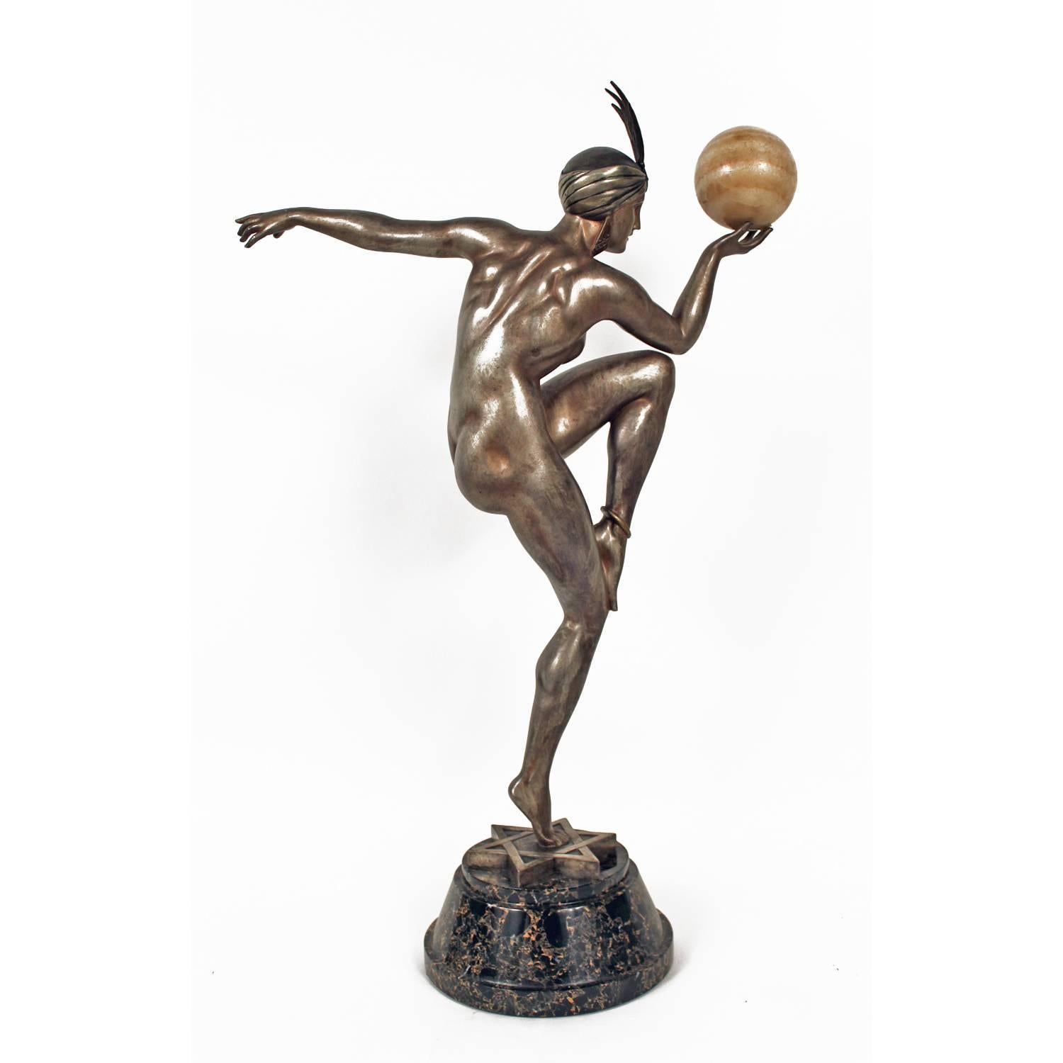 Iconic Art Deco silver plated bronze sculpture entitled Stella by Maurice Guiraud-Riviere depicting a female figure holding a marble globe.
Made in France
circa 1925
Signature: Guiraud-Riviere.