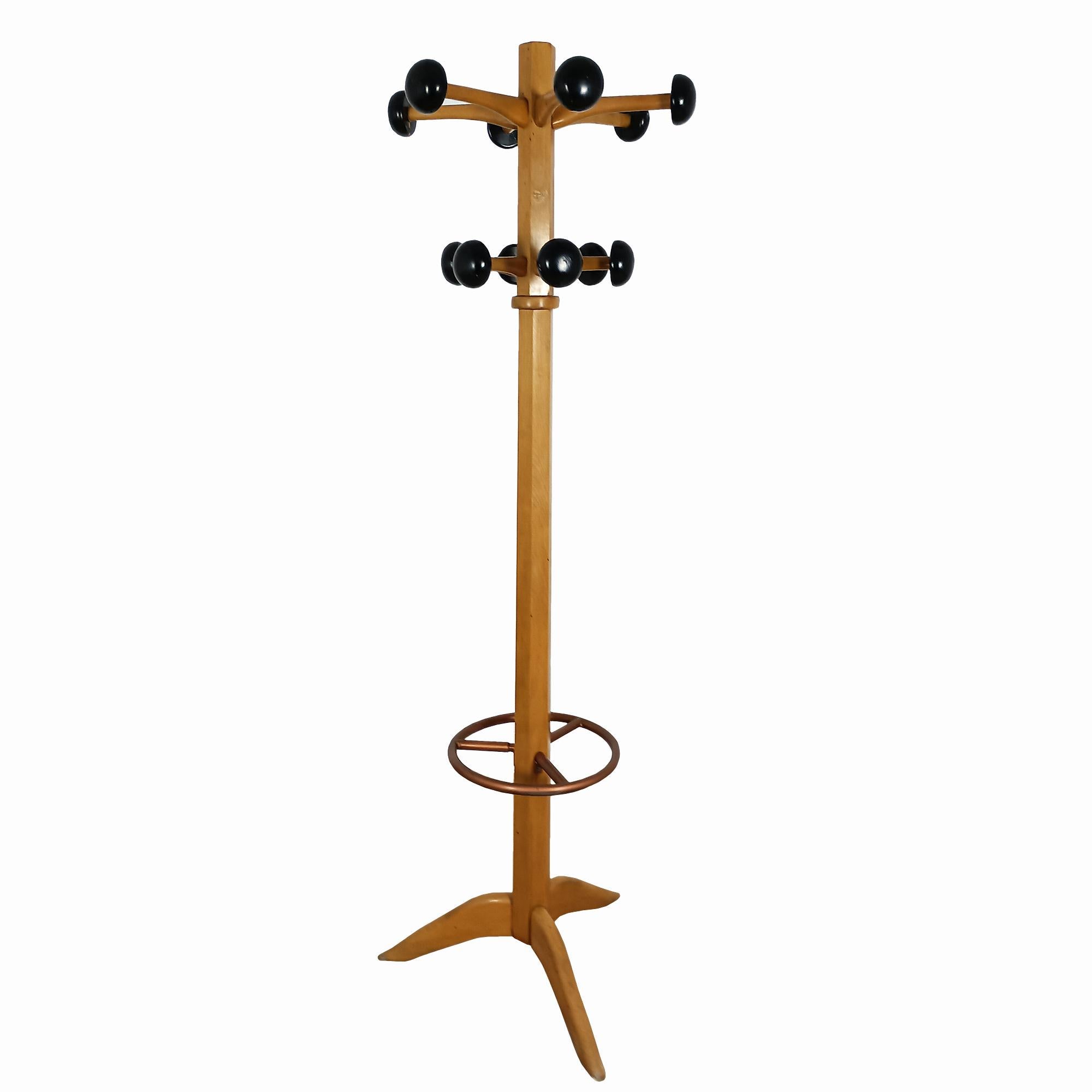 Coat rack in solid beech with 12 black lacquered coat hooks. Copper metal umbrella stand. Removable upper part. 
Manufactured by Stella. Original label.

France c. 1950.