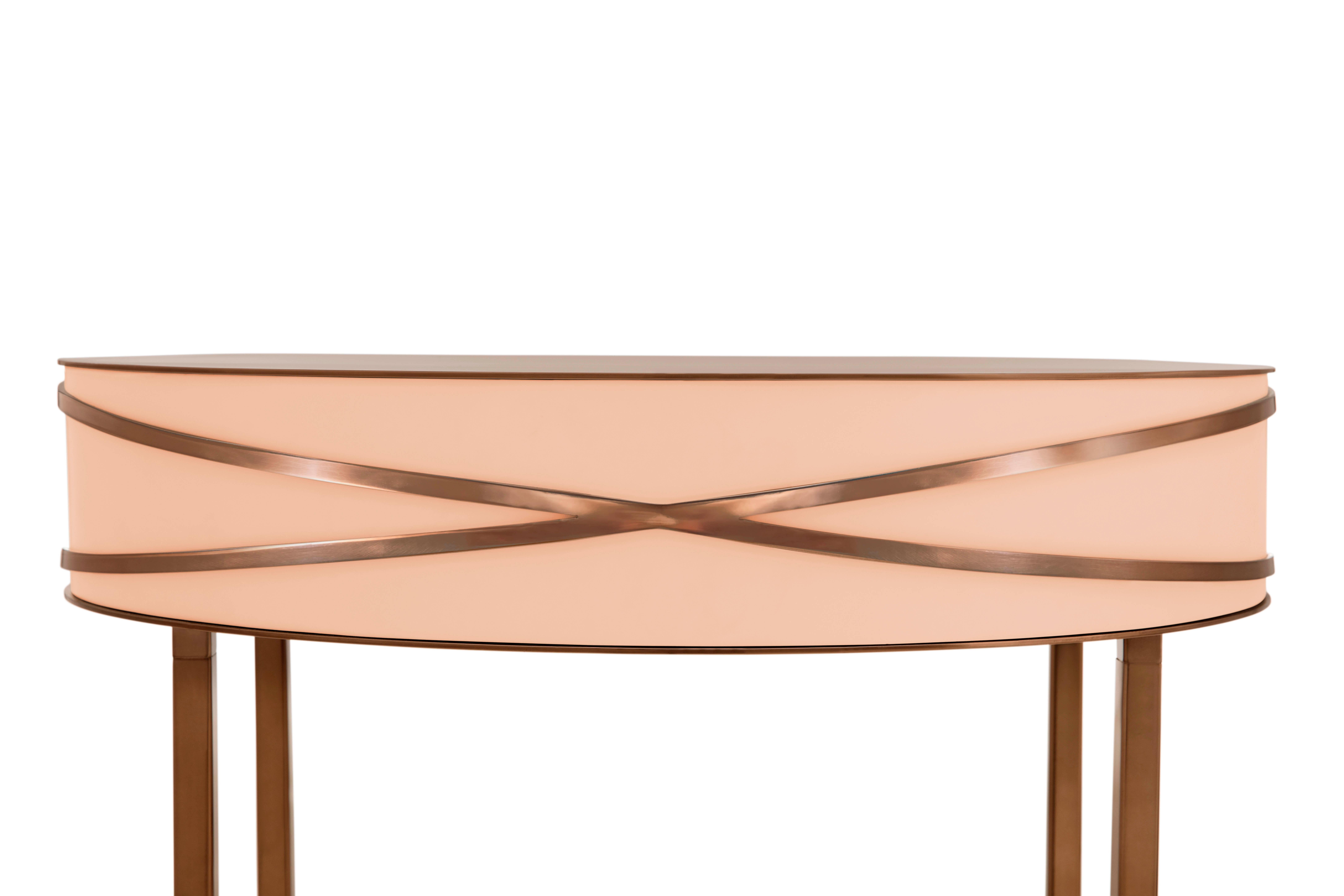 Stella Pink Console or Bedside Table with Rose Gold Trims by Nika Zupanc is a pink console table with a drawer, and metal trims in rose gold.

Nika Zupanc, a strikingly renowned Slovenian designer, never shies away from redefining the status quo of