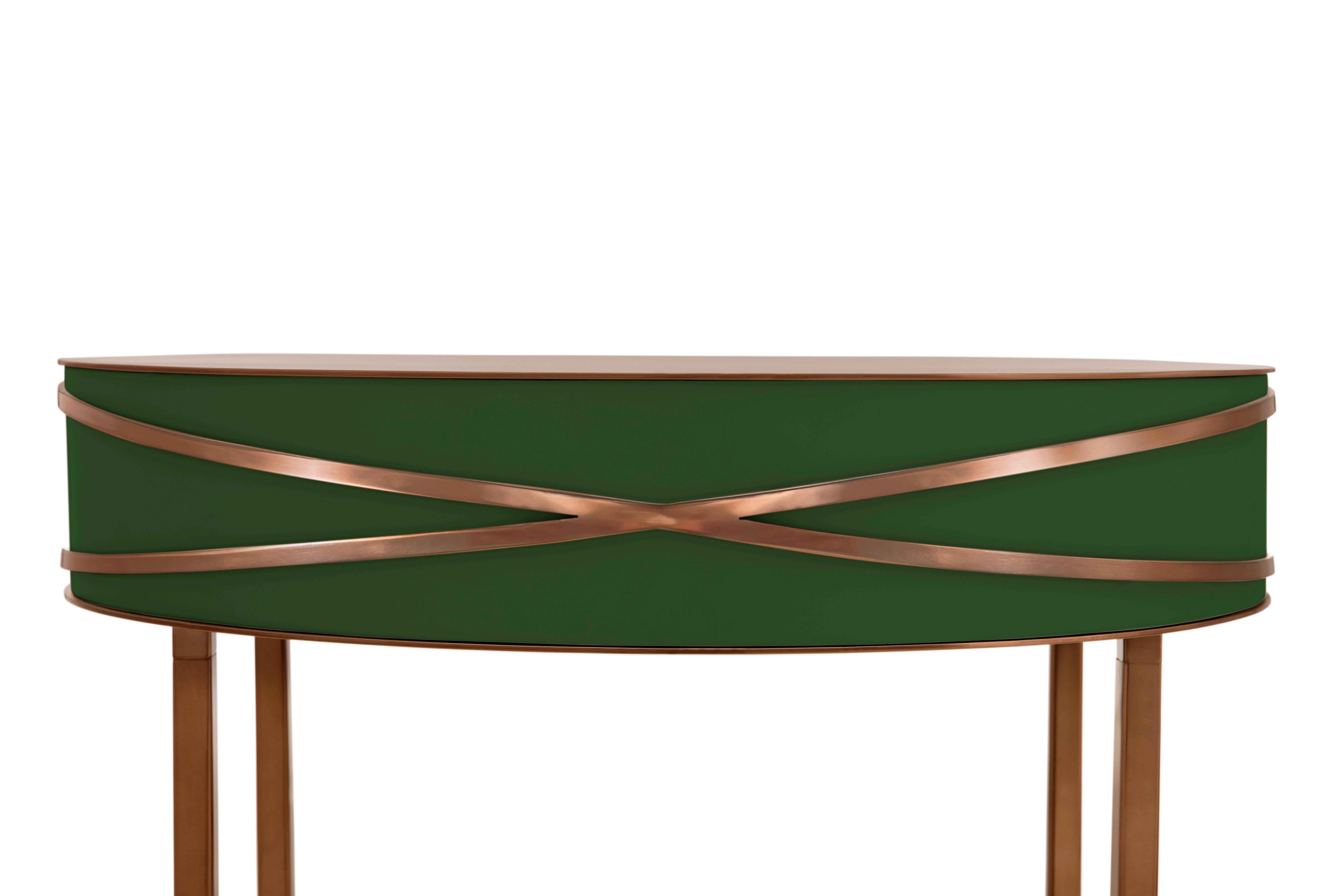 Stella Green Console or Bedside Table with Rose Gold Trims by Nika Zupanc is a deep green console table with a drawer, and metal trims in rose gold.

Nika Zupanc, a strikingly renowned Slovenian designer, never shies away from redefining the status