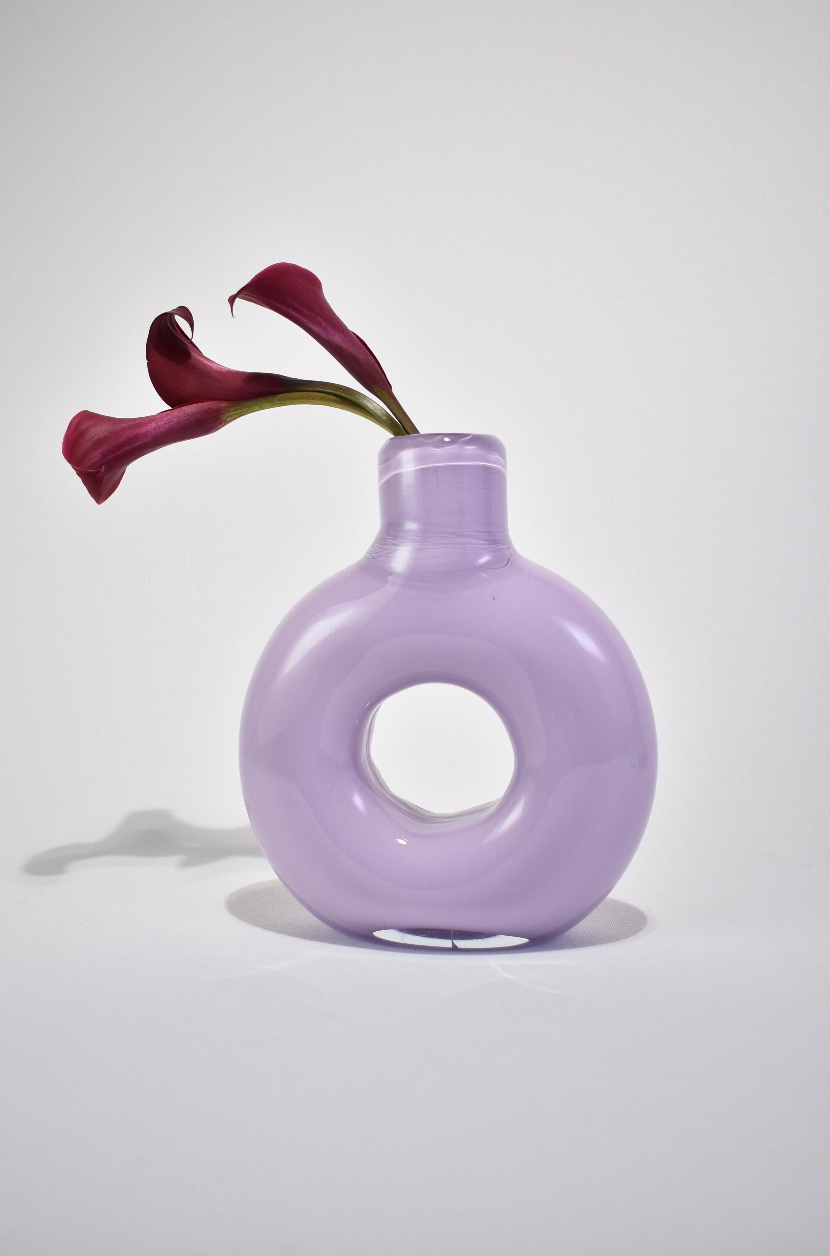 Our in-house collection features modern rounded shapes in bright opaque colors resulting in a functional, beautiful piece to be admired and used often. Each vessel is hand blown in Richmond, Virginia and one-of-a-kind.

Rounded decanter with