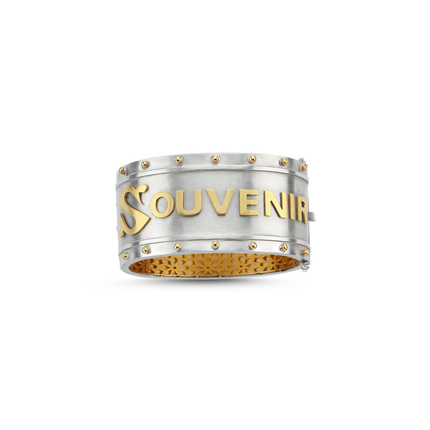 Stella Flame’s coastal themed “Souvenir” wide bangle bracelet has both a medieval and modern edge and features solid 18K Gold maritime creatures encrusted in colored diamonds elevating it to luxury jewelry status. Handcrafted by Master Jewelers in