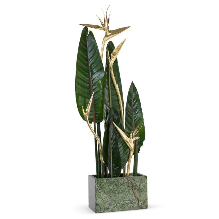 Stella 4 est un vase décoratif qui allie magistralement des éléments naturels et sculpturaux pour créer une œuvre d'art captivante. Ce vase exquis est conçu non seulement comme un récipient fonctionnel, mais aussi comme une sculpture de déclaration,