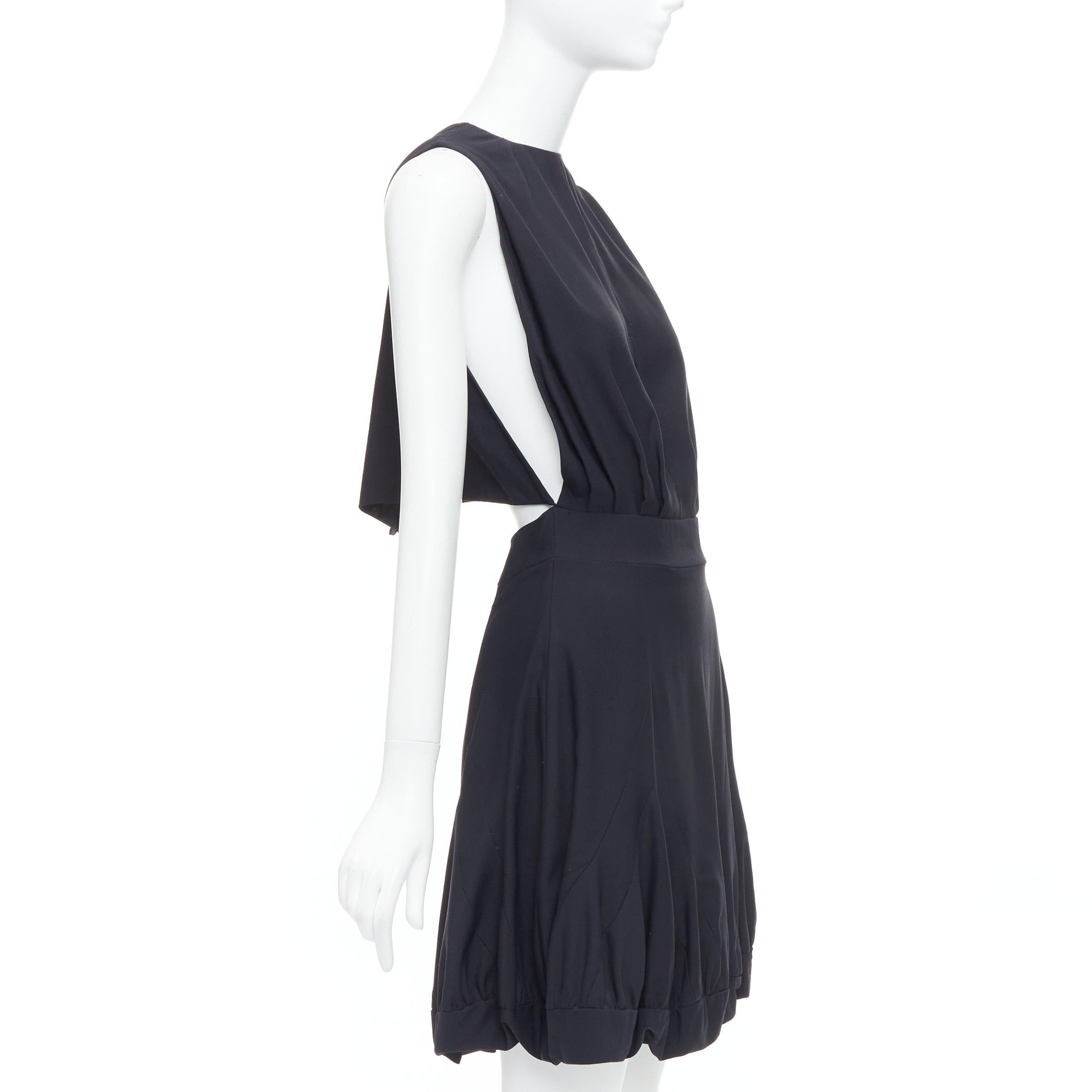 STELLA MCCARTNEY 2005 black backless cutout crew neck dress IT40 S
Reference: MECG/A00025
Brand: Stella McCartney
Designer: Stella McCartney
Collection: 2005
Material: Rayon, Wool
Color: Black
Pattern: Solid
Closure: Zip
Lining: Black Silk
Extra