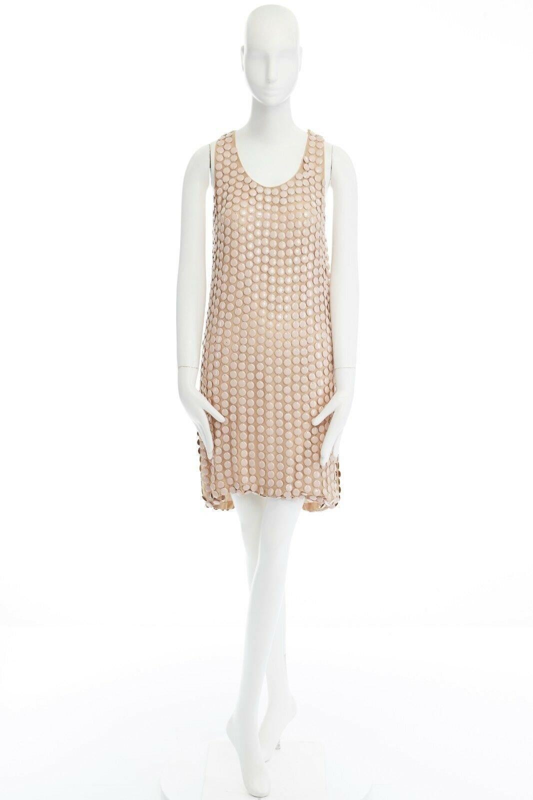 STELLA MCCARTNEY 2005 pink metal paillettes racer back mini dress IT42 M 
Reference: CC/AECG00032 
Brand: Stella McCartney 
Designer: Stella McCartney 
Collection: AD2005 
Material: Silk 
Color: Cream 
Pattern: Other 
Extra Detail: Peach dress. 100%