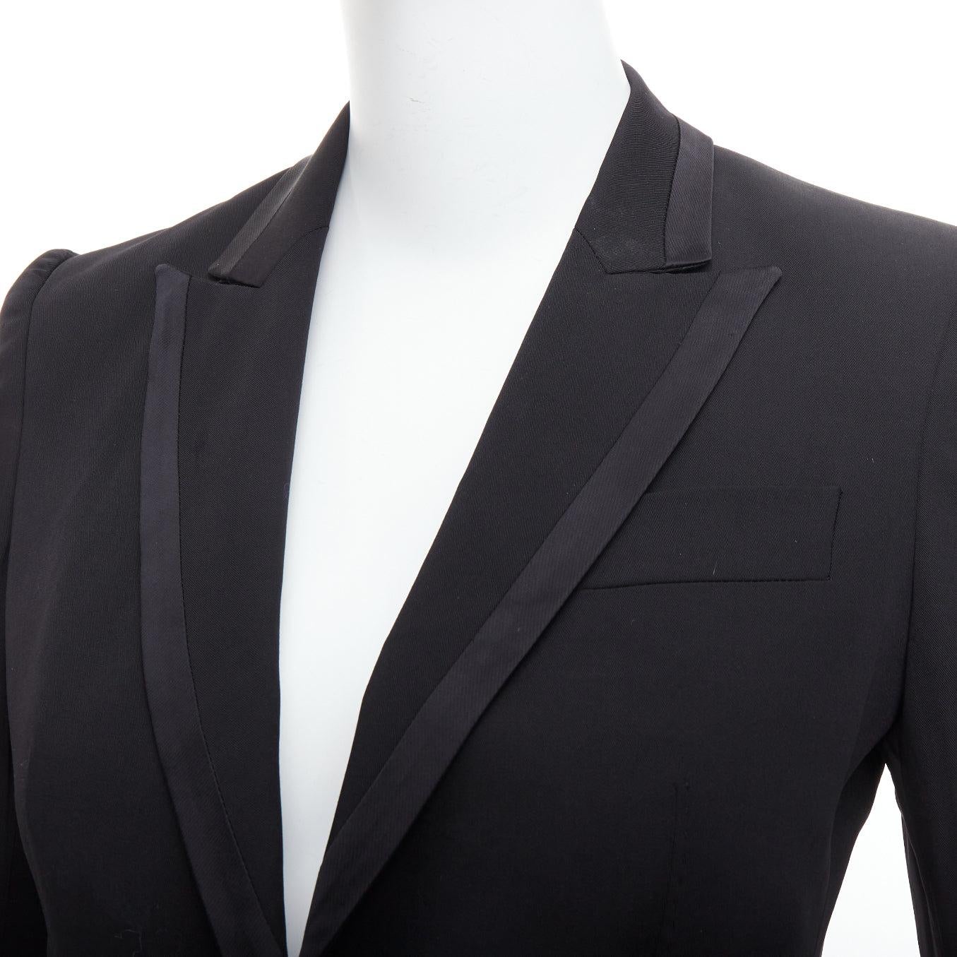 STELLA MCCARTNEY 2008 black wool blend peak collar blazer IT36 XXS
Reference: ECLO/A00039
Brand: Stella McCartney
Designer: Stella McCartney
Collection: 2008
Material: Wool, Blend
Color: Black
Pattern: Solid
Closure: Button
Lining: Black