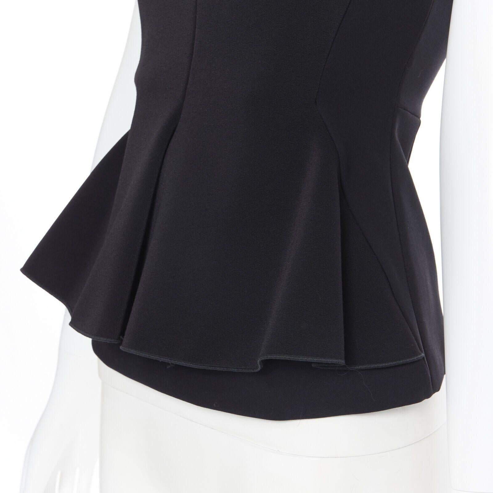 STELLA MCCARTNEY 2011 black sweetheart neckline seam peplum sleeveless top IT38
Reference: LNKO/A01579
Brand: Stella McCartney
Designer: Stella McCartney
Model: Peplum top
Collection: 2011
Material: Cotton, Blend
Color: Black
Pattern: Solid
Closure: