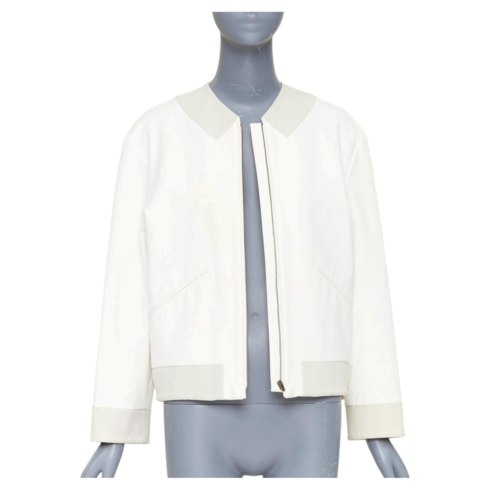 Stella McCartney 2011, chaqueta bomber sin cuello con paneles de algodón en color blanco roto y cremallera, talla IT36, XXS