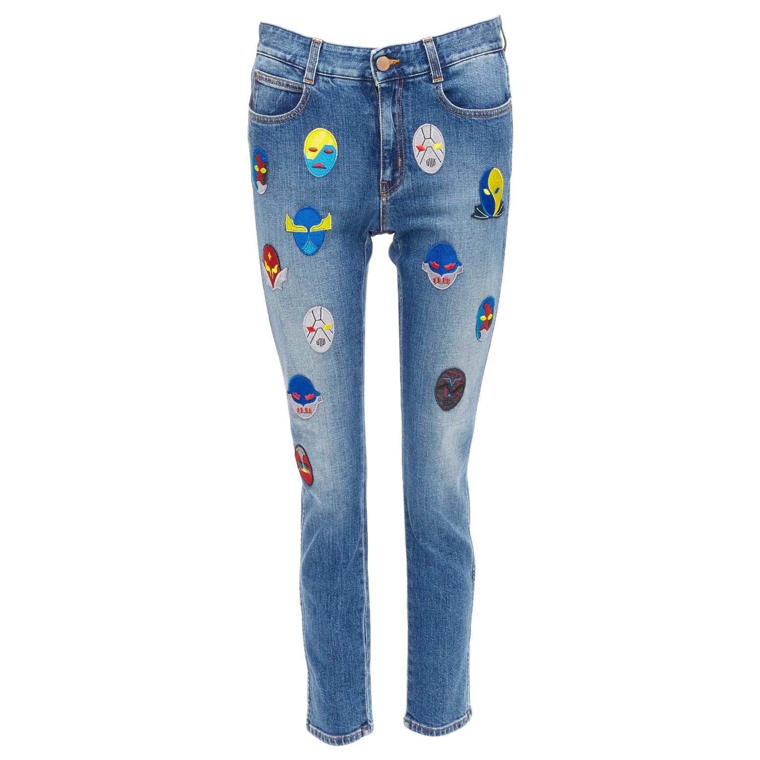 STELLA MCCARTNEY 2014 jaune bleu patch superhero jeans cropped 25" en vente