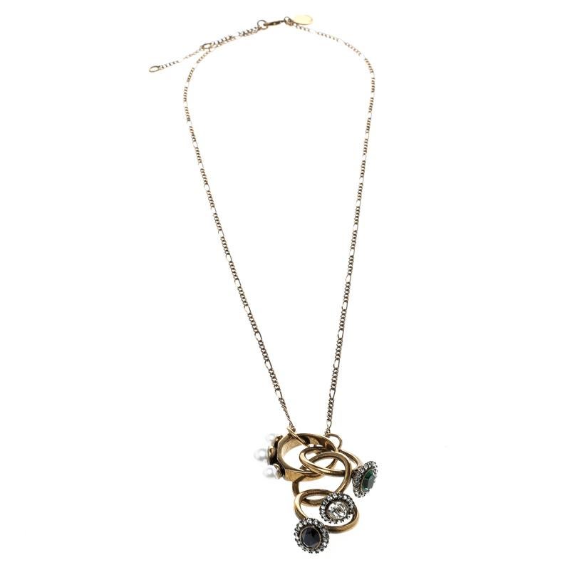 To adorn with style, Stella McCartney brings you this simple necklace that has been made from gold-tone metal. It is a piece that will naturally evoke your love as it is well made and it comes with a pendant of 4 rings with faux pearls and crystals